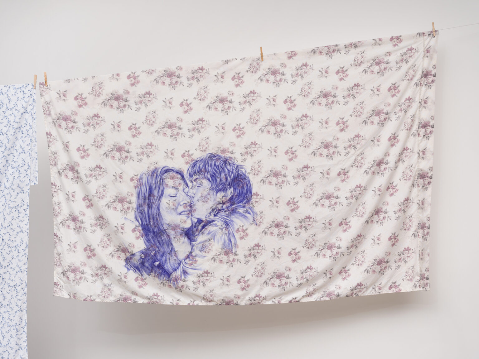 Shizu Saldamando, San Cha and Prisk, 2024. Ballpoint pen on found twin-sized bed sheet. 64 × 89 1/2 in. The Museum of Contemporary Art, Los Angeles, Purchase with funds provided by Beth Swofford by exchange. © Shizu Saldamando. Photo by Jeff McLane.