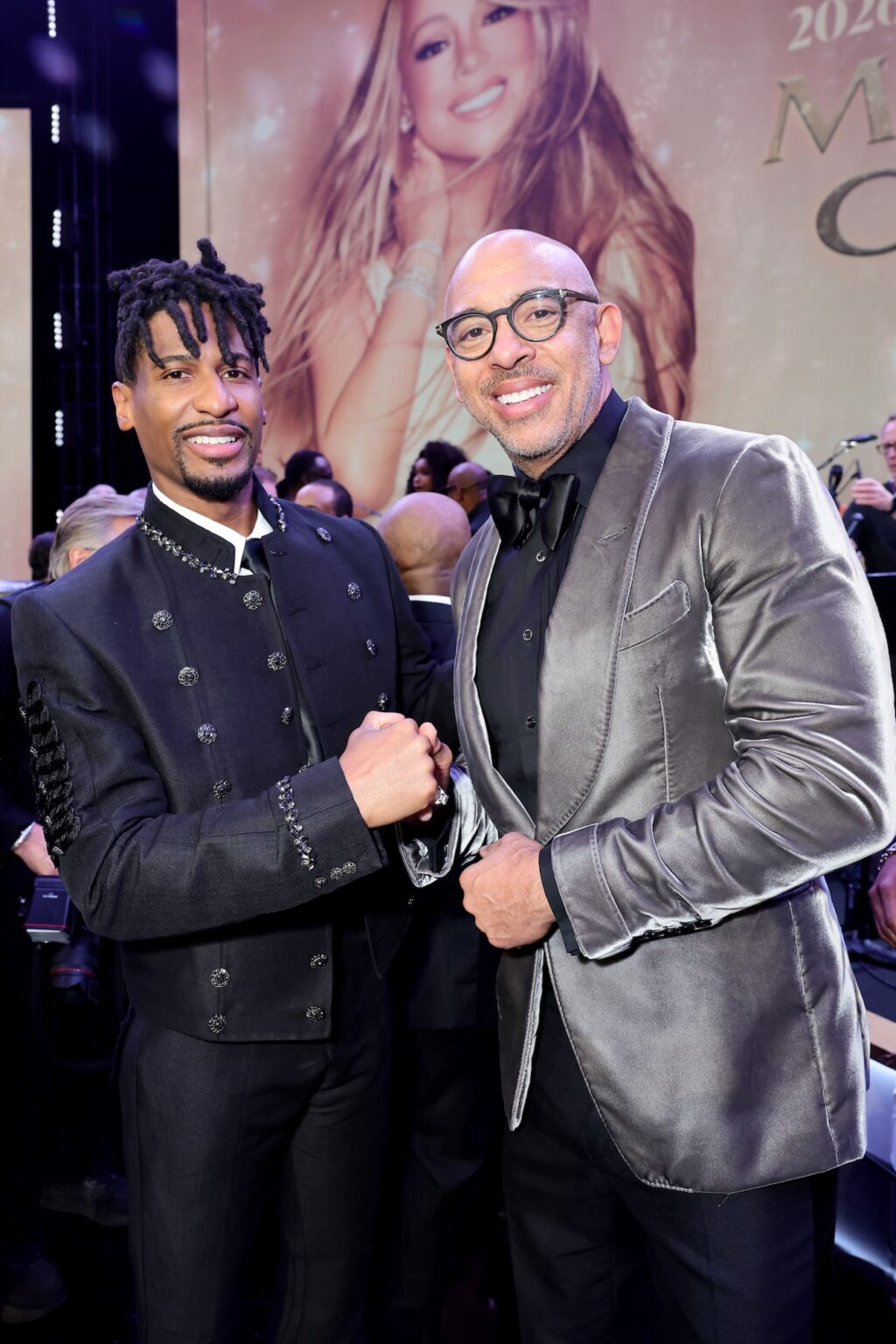 LOS ANGELES, CALIFORNIA - JANUARY 30: (L-R) Jon Batiste and Harvey Mason jr., CEO, MusiCares & Recording Academy attend 2026 MusiCares Person of the Year Honoring Mariah Carey on January 30, 2026 in Los Angeles, California. (Photo by Emma McIntyre/Getty Images for The Recording Academy)