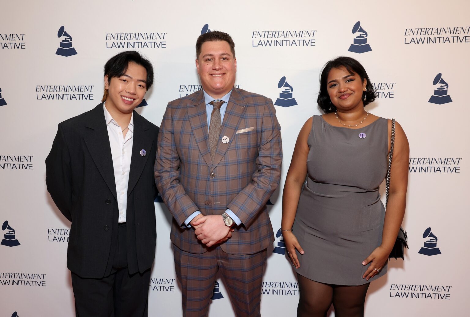 LOS ANGELES, CALIFORNIA - JANUARY 30: (L-R) Derek Son, Justin Fisher and Anika Kazi attend the 68th GRAMMY Awards - 28th Annual Entertainment Law Initiative Luncheon on January 30, 2026 in Los Angeles, California. (Photo by Jesse Grant/Getty Images for The Recording Academy)