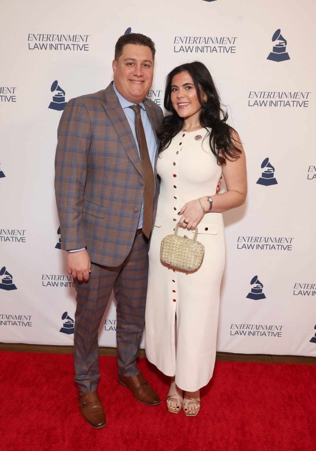 LOS ANGELES, CALIFORNIA - JANUARY 30: Justin Fisher and Madison Dearman attend the 68th GRAMMY Awards - 28th Annual Entertainment Law Initiative Luncheon on January 30, 2026 in Los Angeles, California. (Photo by Jesse Grant/Getty Images for The Recording Academy)