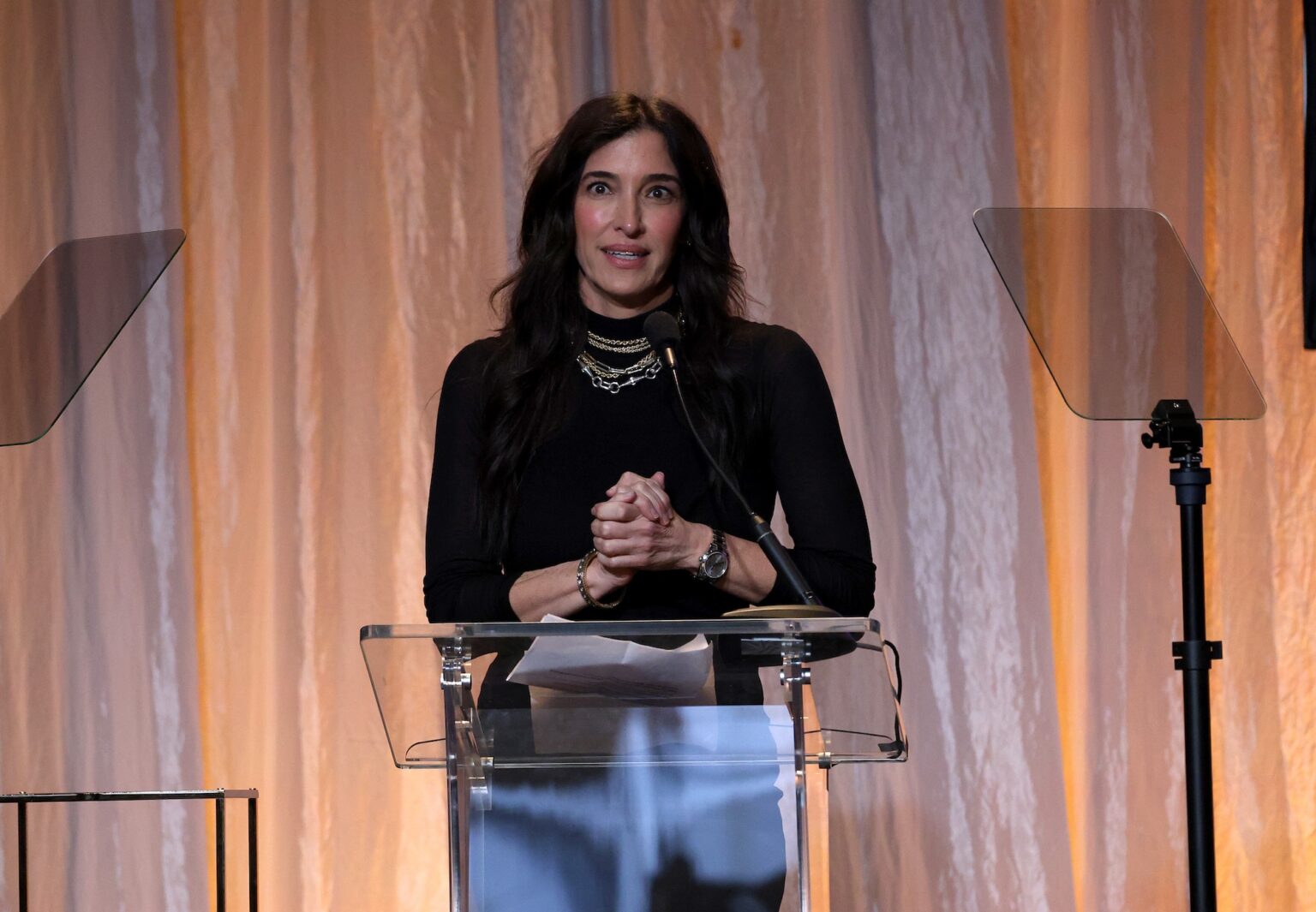LOS ANGELES, CALIFORNIA - JANUARY 30: Renee Karalian speaks during the 68th GRAMMY Awards - 28th Annual Entertainment Law Initiative Luncheon on January 30, 2026 in Los Angeles, California. (Photo by Jesse Grant/Getty Images for The Recording Academy)