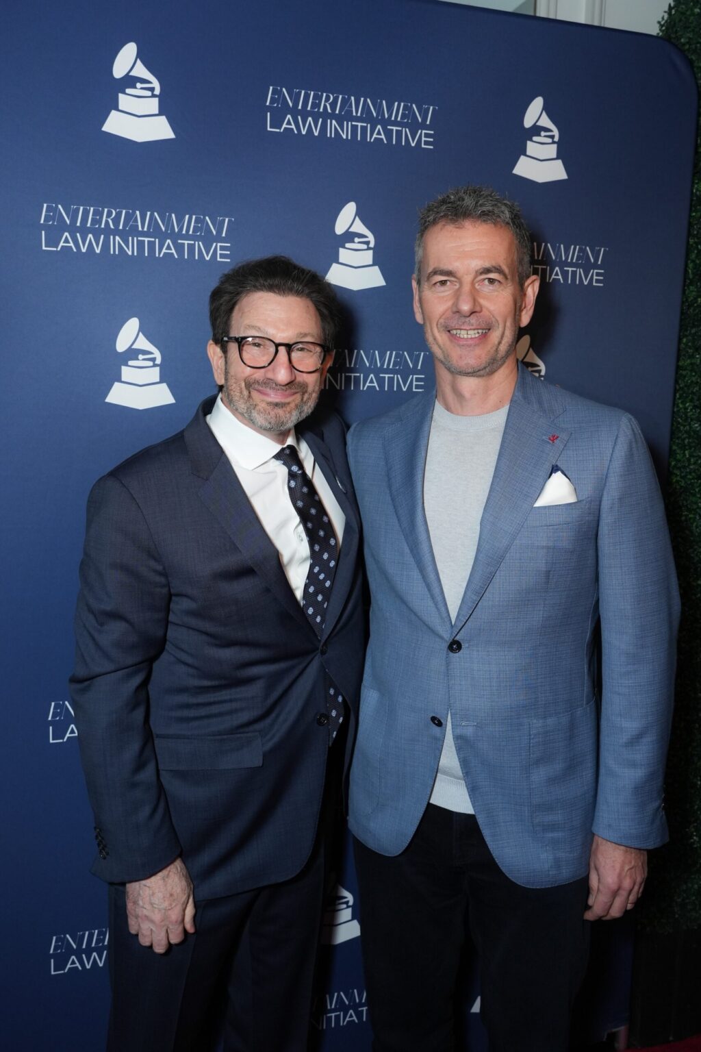LOS ANGELES, CALIFORNIA - JANUARY 30: Paul Robinson and Robert Kyncl during the 68th GRAMMY Awards - 28th Annual Entertainment Law Initiative Luncheon on January 30, 2026 in Los Angeles, California. (Photo by Gonzalo Marroquin/Getty Images for The Recording Academy)