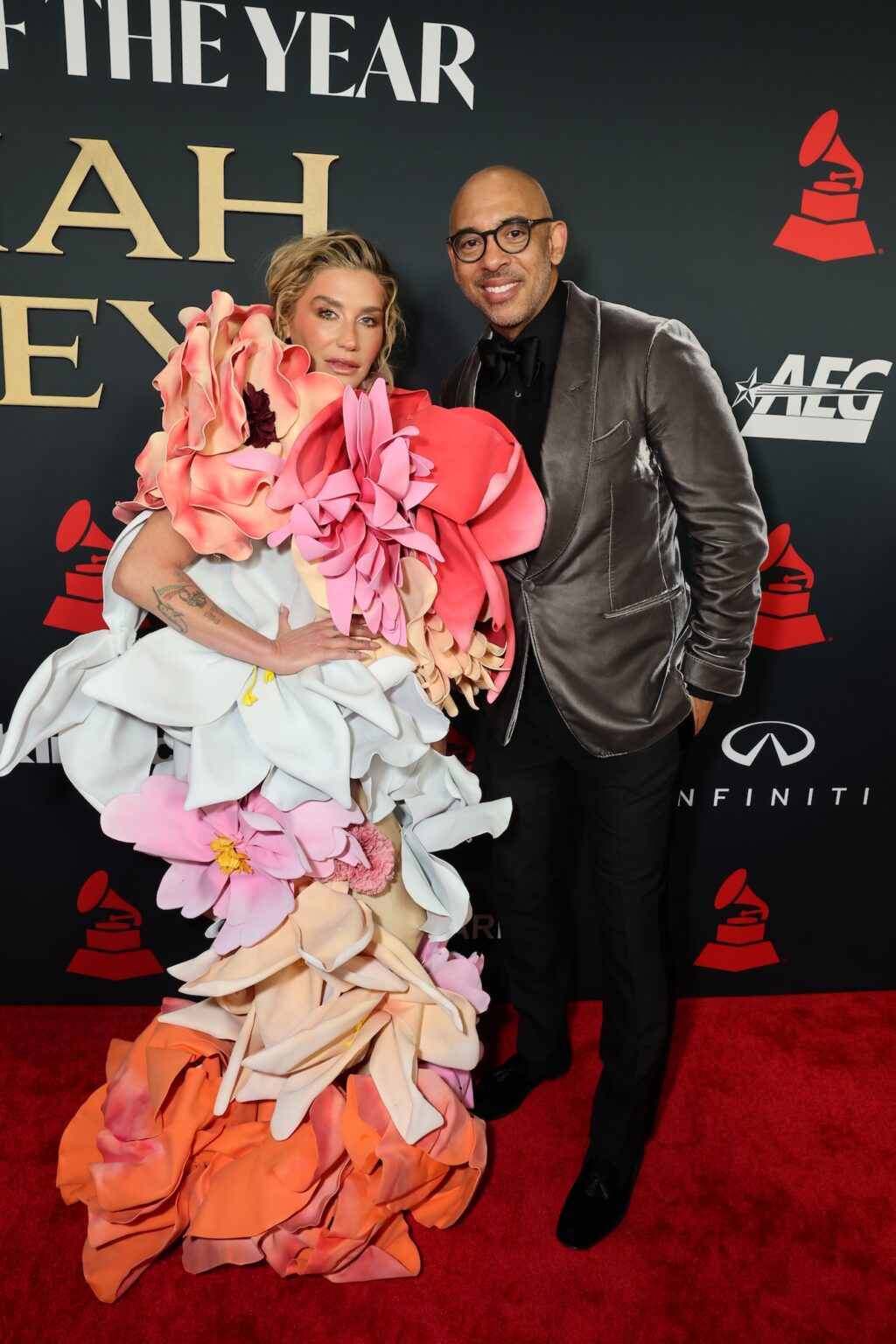 LOS ANGELES, CALIFORNIA - JANUARY 30: (L-R) Kesha and Harvey Mason jr., CEO, MusiCares & Recording Academy attend 2026 MusiCares Person of the Year Honoring Mariah Carey on January 30, 2026 in Los Angeles, California. (Photo by Emma McIntyre/Getty Images for The Recording Academy)