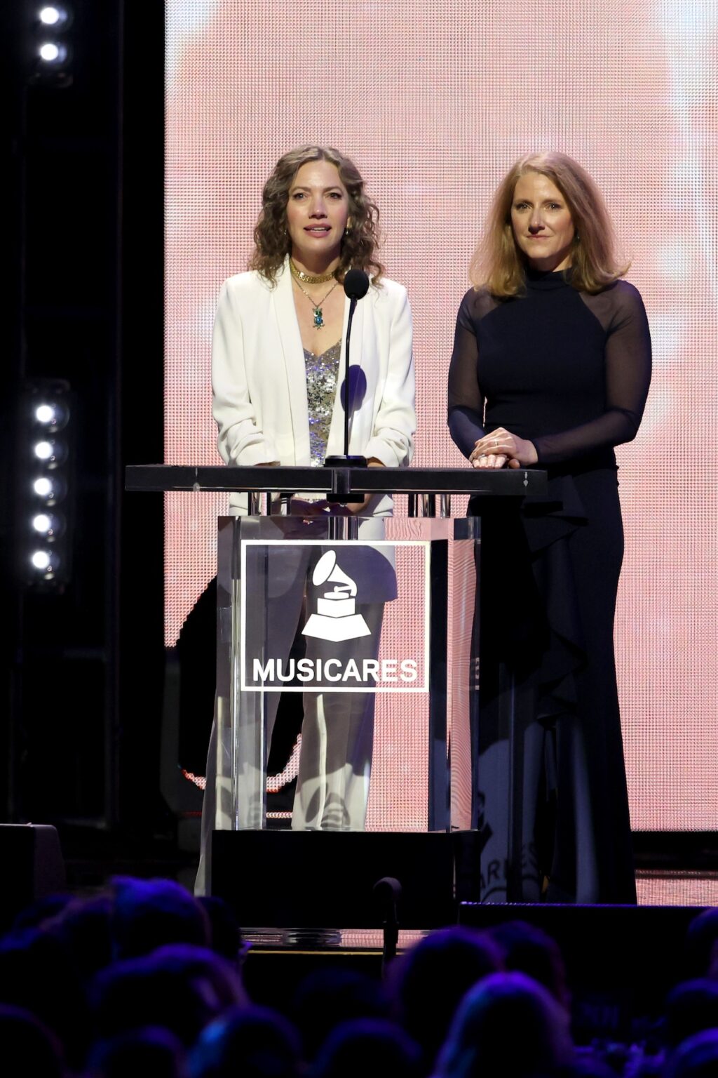 LOS ANGELES, CALIFORNIA - JANUARY 30: (L-R) Carianne Marshall and Theresa Wolters, Executive Director, MusiCares, speak onstage during 2026 MusiCares Person of the Year Honoring Mariah Carey on January 30, 2026 in Los Angeles, California. (Photo by Matt Winkelmeyer/Getty Images for The Recording Academy)