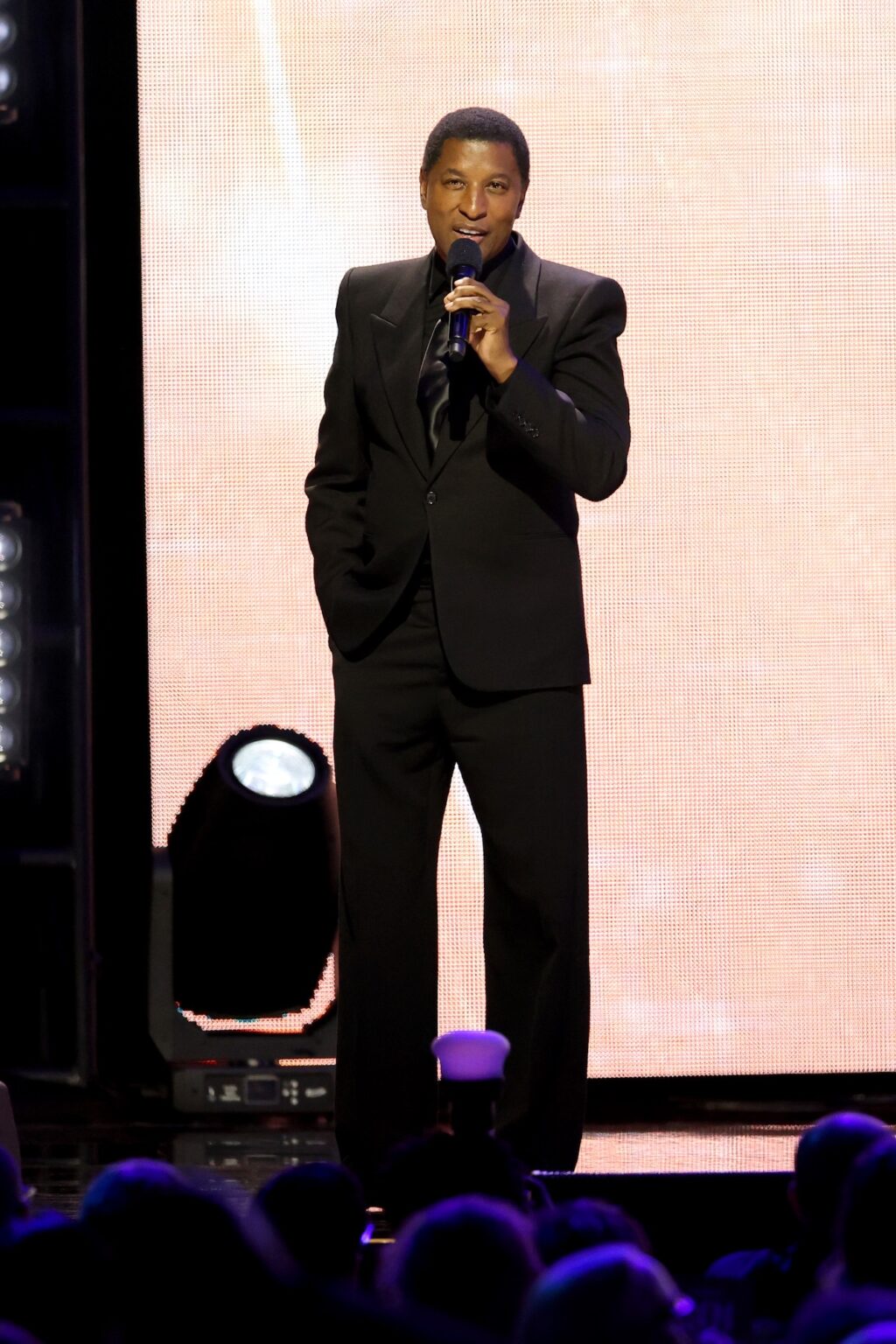 LOS ANGELES, CALIFORNIA - JANUARY 30: Babyface speaks onstage during 2026 MusiCares Person of the Year Honoring Mariah Carey on January 30, 2026 in Los Angeles, California. (Photo by Matt Winkelmeyer/Getty Images for The Recording Academy)