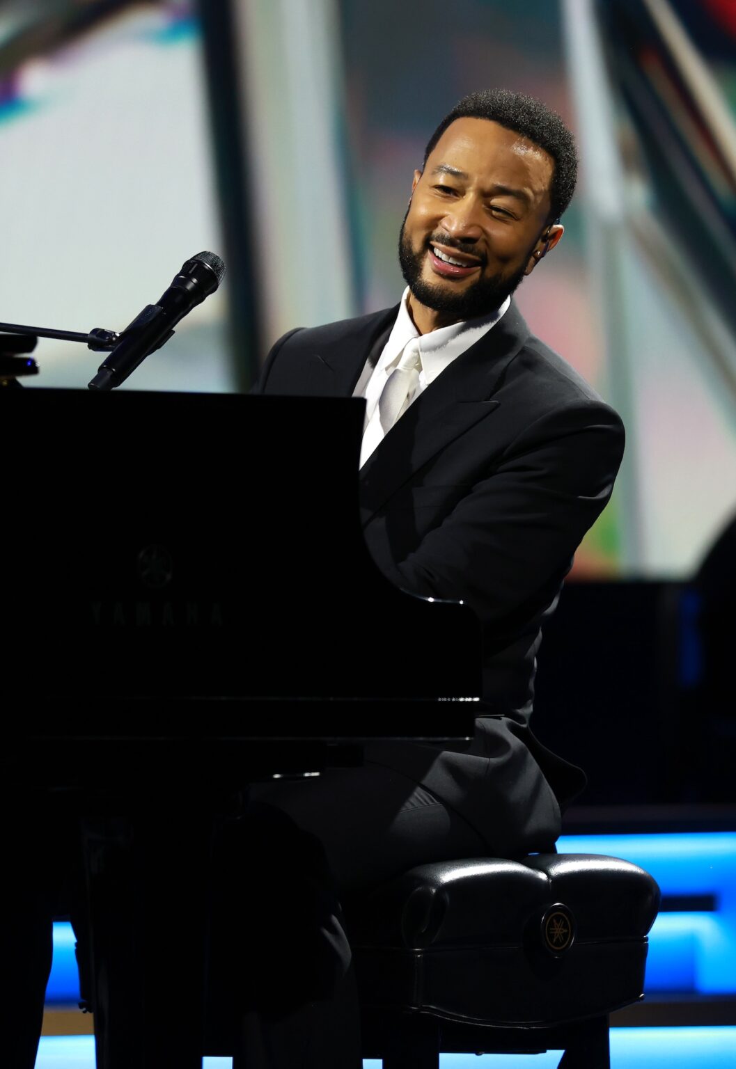 LOS ANGELES, CALIFORNIA - JANUARY 30: John Legend performs onstage at 2026 MusiCares Person of the Year Honoring Mariah Carey on January 30, 2026 in Los Angeles, California. (Photo by Kevin Mazur/Getty Images for The Recording Academy)