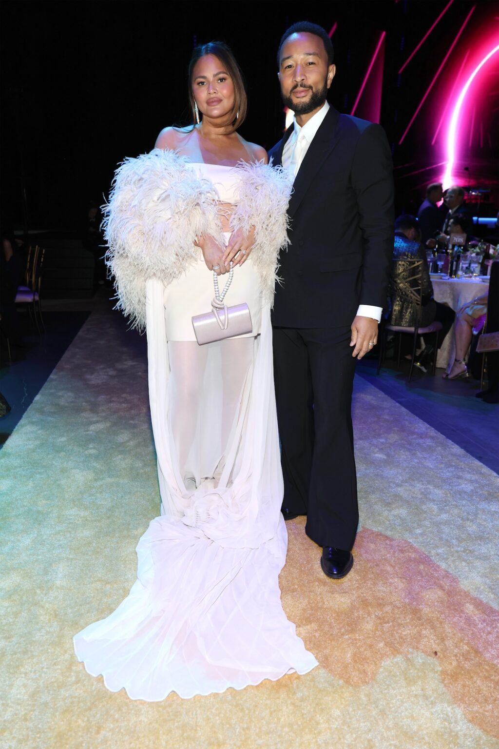 LOS ANGELES, CALIFORNIA - JANUARY 30: (L-R) Chrissy Teigen and John Legend attend 2026 MusiCares Person of the Year Honoring Mariah Carey on January 30, 2026 in Los Angeles, California. (Photo by Kevin Mazur/Getty Images for The Recording Academy)