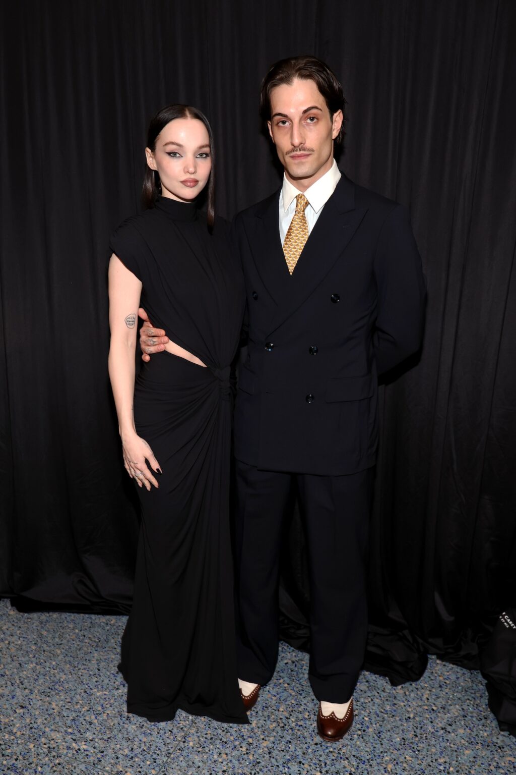 LOS ANGELES, CALIFORNIA - JANUARY 30: (L-R) Dove Cameron and Damiano David attend 2026 MusiCares Person of the Year Honoring Mariah Carey on January 30, 2026 in Los Angeles, California. (Photo by Kevin Mazur/Getty Images for The Recording Academy)