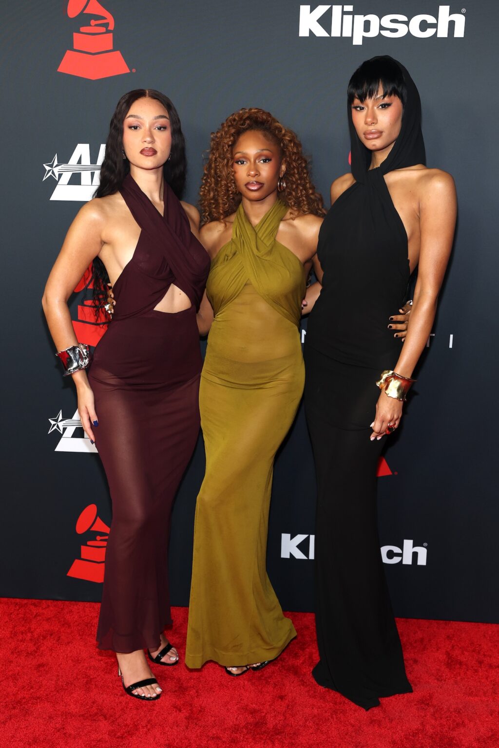 LOS ANGELES, CALIFORNIA - JANUARY 30: (L-R) Stella Quaresma, Renée Downer and Jorja Douglas of Flo attend 2026 MusiCares Person of the Year Honoring Mariah Carey on January 30, 2026 in Los Angeles, California. (Photo by Matt Winkelmeyer/Getty Images for The Recording Academy)