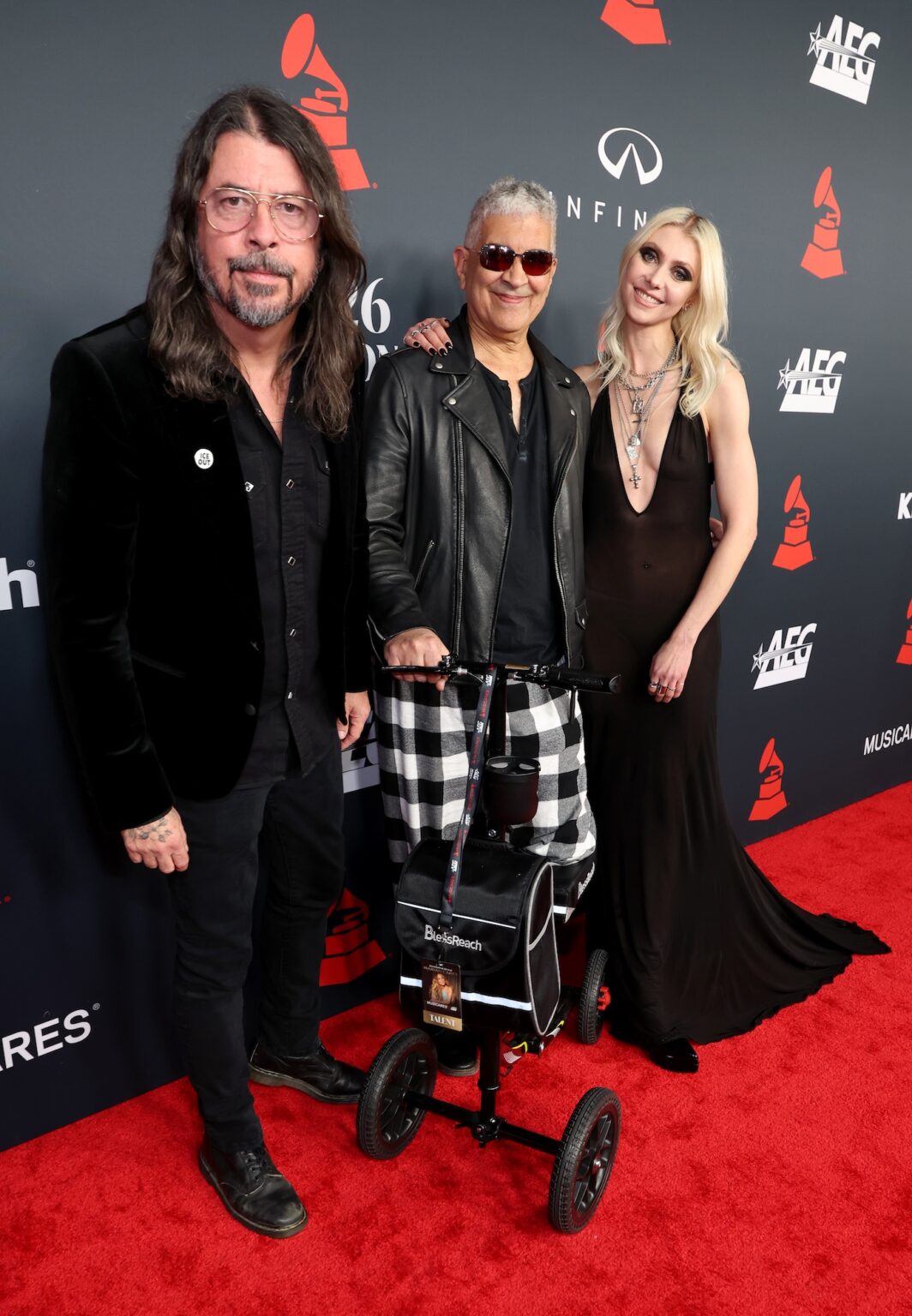 LOS ANGELES, CALIFORNIA - JANUARY 30: (EDITOR'S NOTE: IMAGE CONTAINS PARTIAL NUDITY) Dave Grohl, Pat Smear and Taylor Momsen attend 2026 MusiCares Person of the Year Honoring Mariah Carey on January 30, 2026 in Los Angeles, California. (Photo by Kevin Mazur/Getty Images for The Recording Academy)