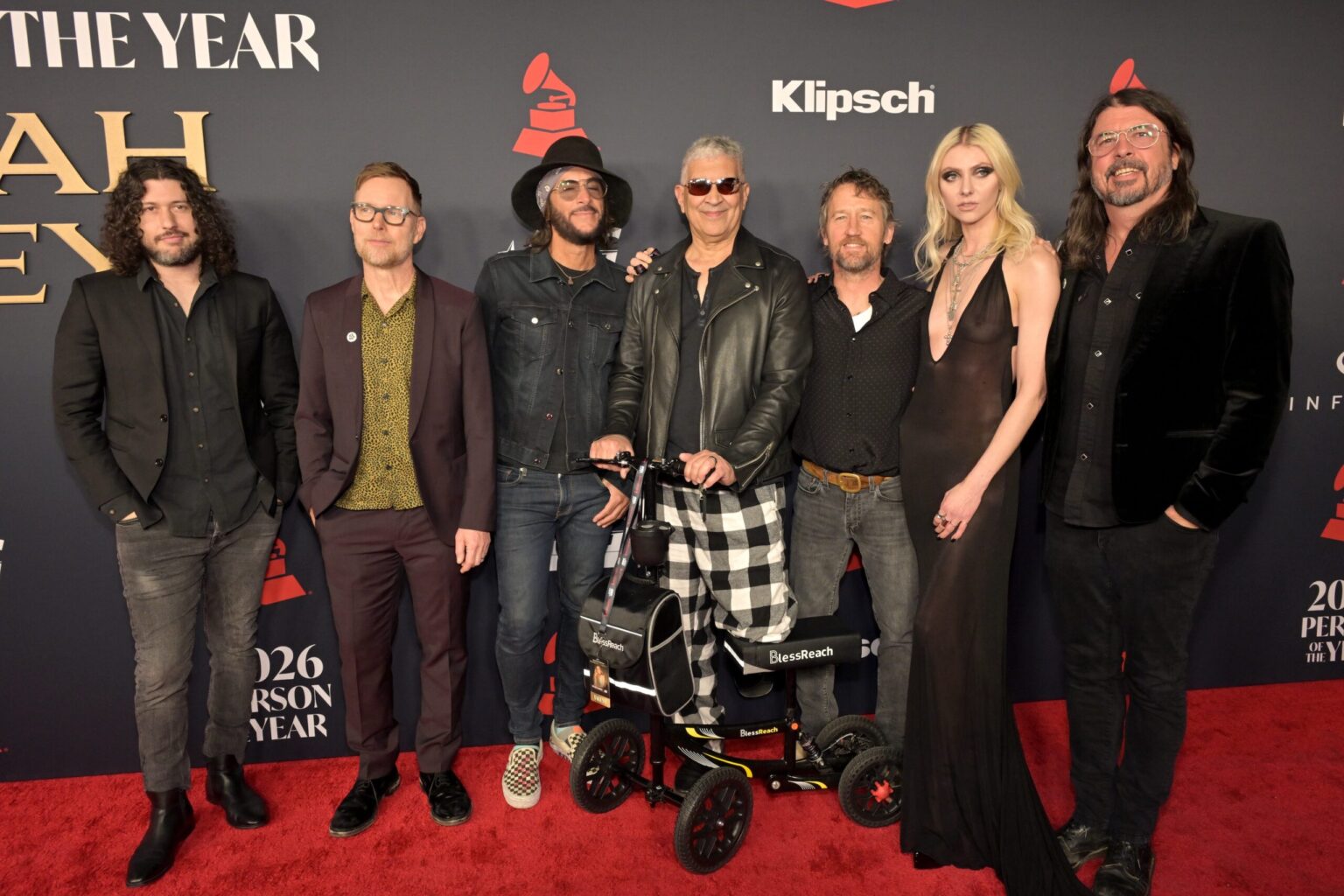 LOS ANGELES, CALIFORNIA - JANUARY 30: (EDITORS NOTE: Image contains partial nudity.) (L-R) Ilan Rubin, Nate Mendel, Rami Jaffee, Pat Smear, Chris Shiflett, Taylor Momsen and Dave Grohl attend 2026 MusiCares Person of the Year Honoring Mariah Carey on January 30, 2026 in Los Angeles, California. (Photo by Lester Cohen/Getty Images for The Recording Academy)