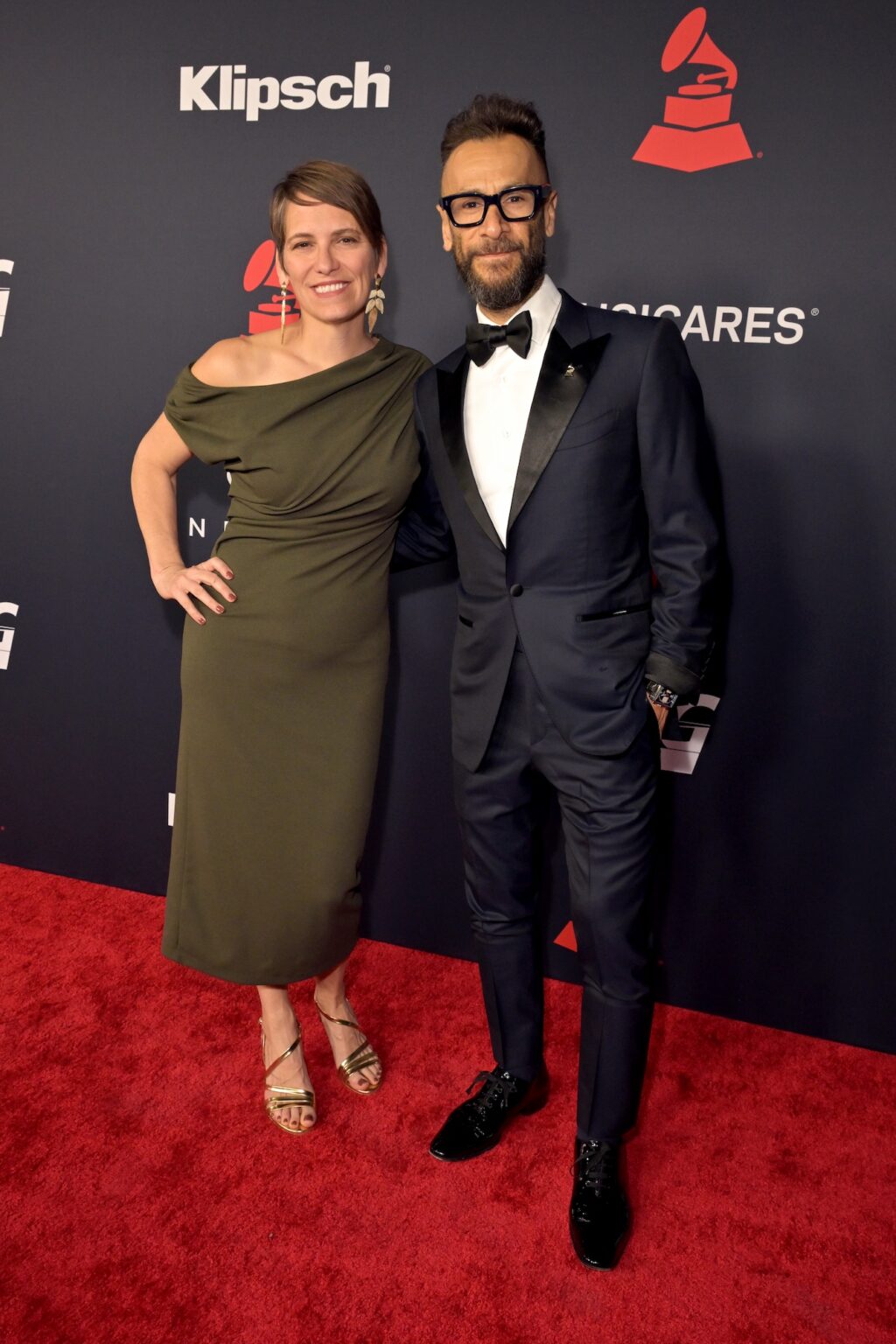 LOS ANGELES, CALIFORNIA - JANUARY 30: (L-R) Kimberly Panay and Panos A. Panay, President, the Recording Academy, attend 2026 MusiCares Person of the Year Honoring Mariah Carey on January 30, 2026 in Los Angeles, California. (Photo by Lester Cohen/Getty Images for The Recording Academy)
