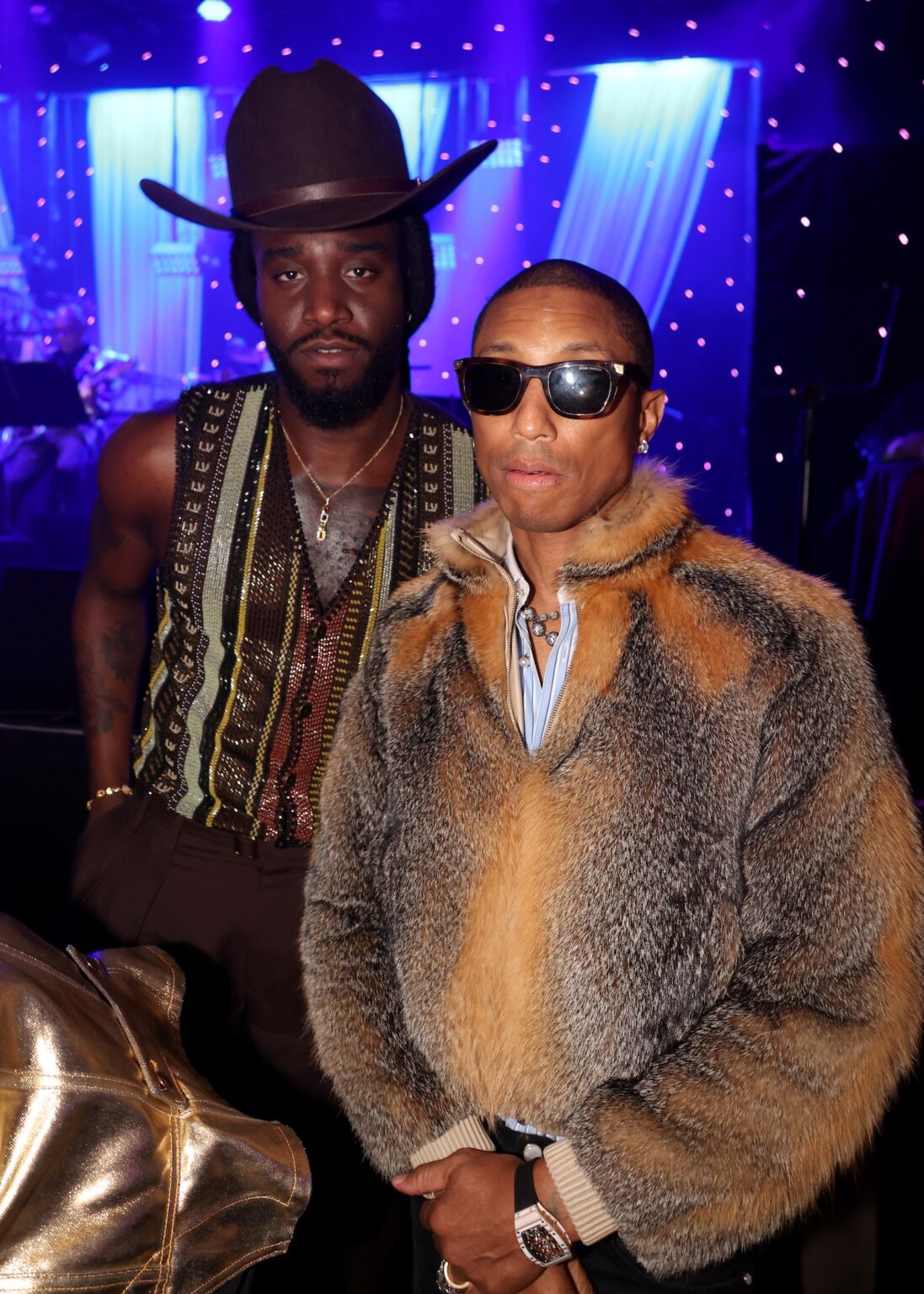 LOS ANGELES, CALIFORNIA - JANUARY 31: (L-R) Shaboozey and Pharrell Williams attend the 68th GRAMMY Awards Pre-GRAMMY Gala & GRAMMY Salute to Industry Icons Honoring Avery Lipman & Monte Lipman on January 31, 2026 in Los Angeles, California. (Photo by Johnny Nunez/Getty Images for The Recording Academy)