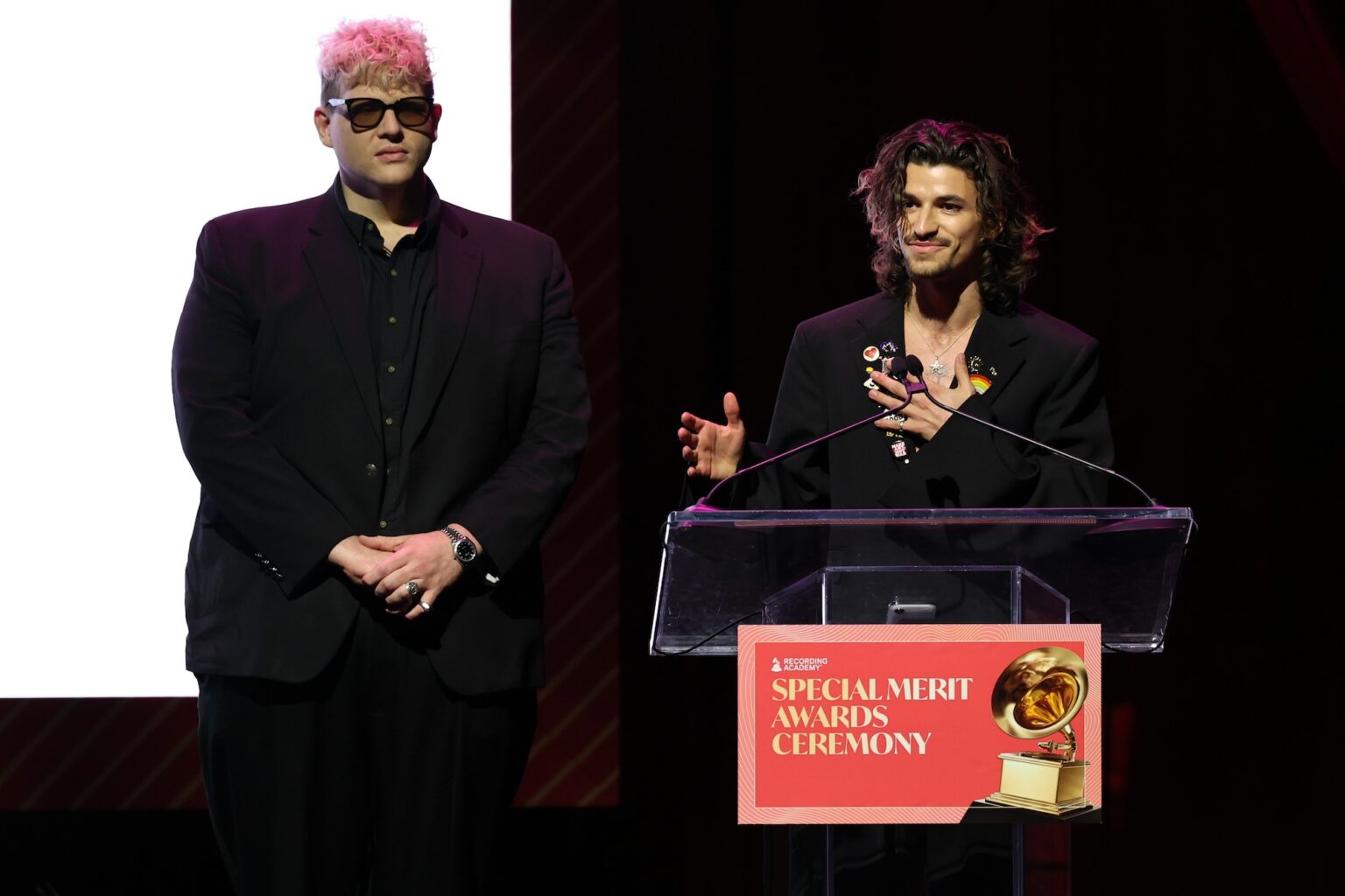LOS ANGELES, CALIFORNIA - JANUARY 31: (L-R) BloodPop and Mike Sabath speak onstage during the Special Merit Awards Ceremony & 68th Annual GRAMMY Nominees Reception during the 68th GRAMMY Awards on January 31, 2026 in Los Angeles, California. (Photo by Monica Schipper/Getty Images for The Recording Academy)
