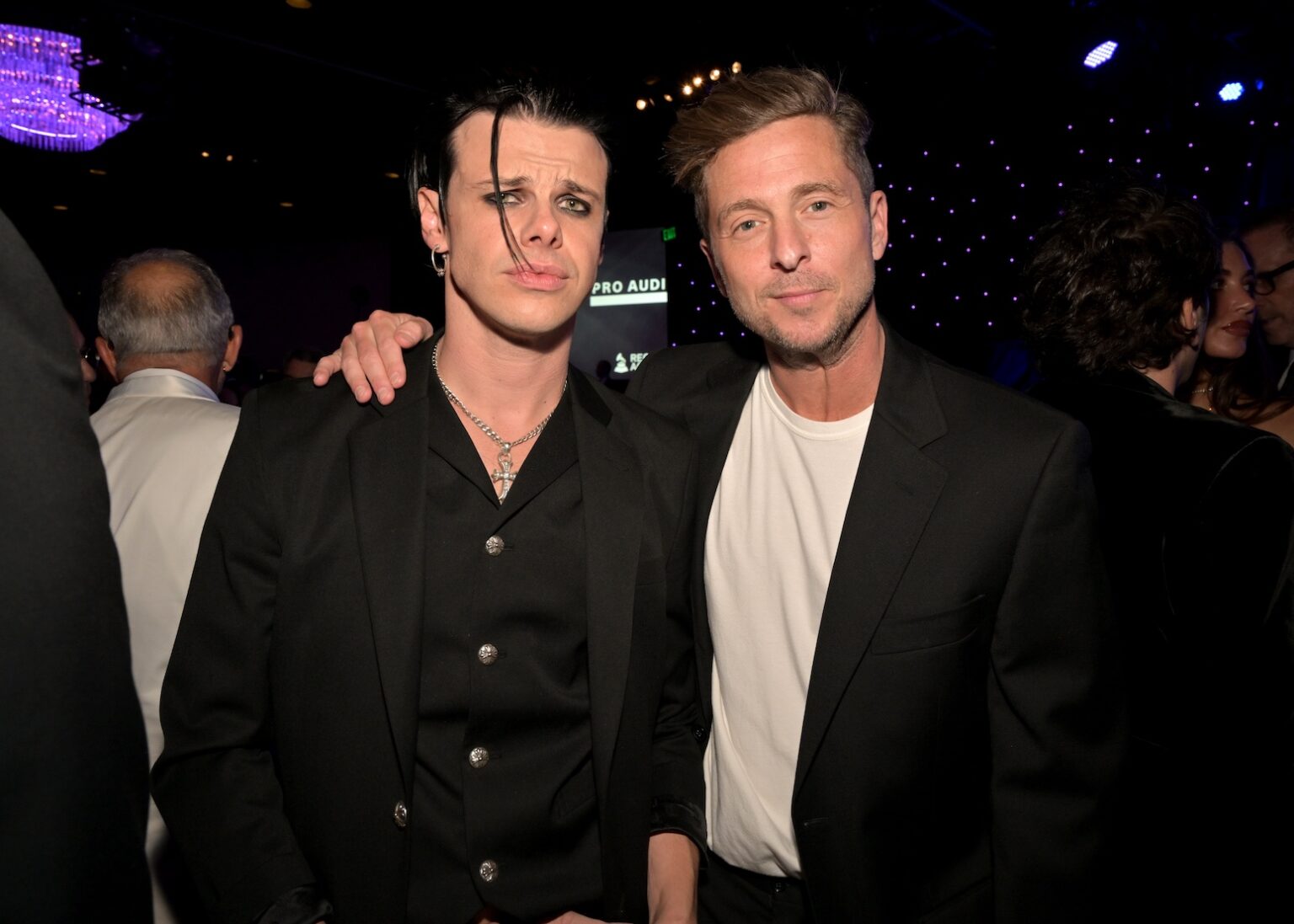 LOS ANGELES, CALIFORNIA - JANUARY 31: (L-R) Yungblud and Ryan Tedder attend the 68th GRAMMY Awards Pre-GRAMMY Gala & GRAMMY Salute to Industry Icons Honoring Avery Lipman & Monte Lipman on January 31, 2026 in Los Angeles, California. (Photo by Lester Cohen/Getty Images for The Recording Academy)