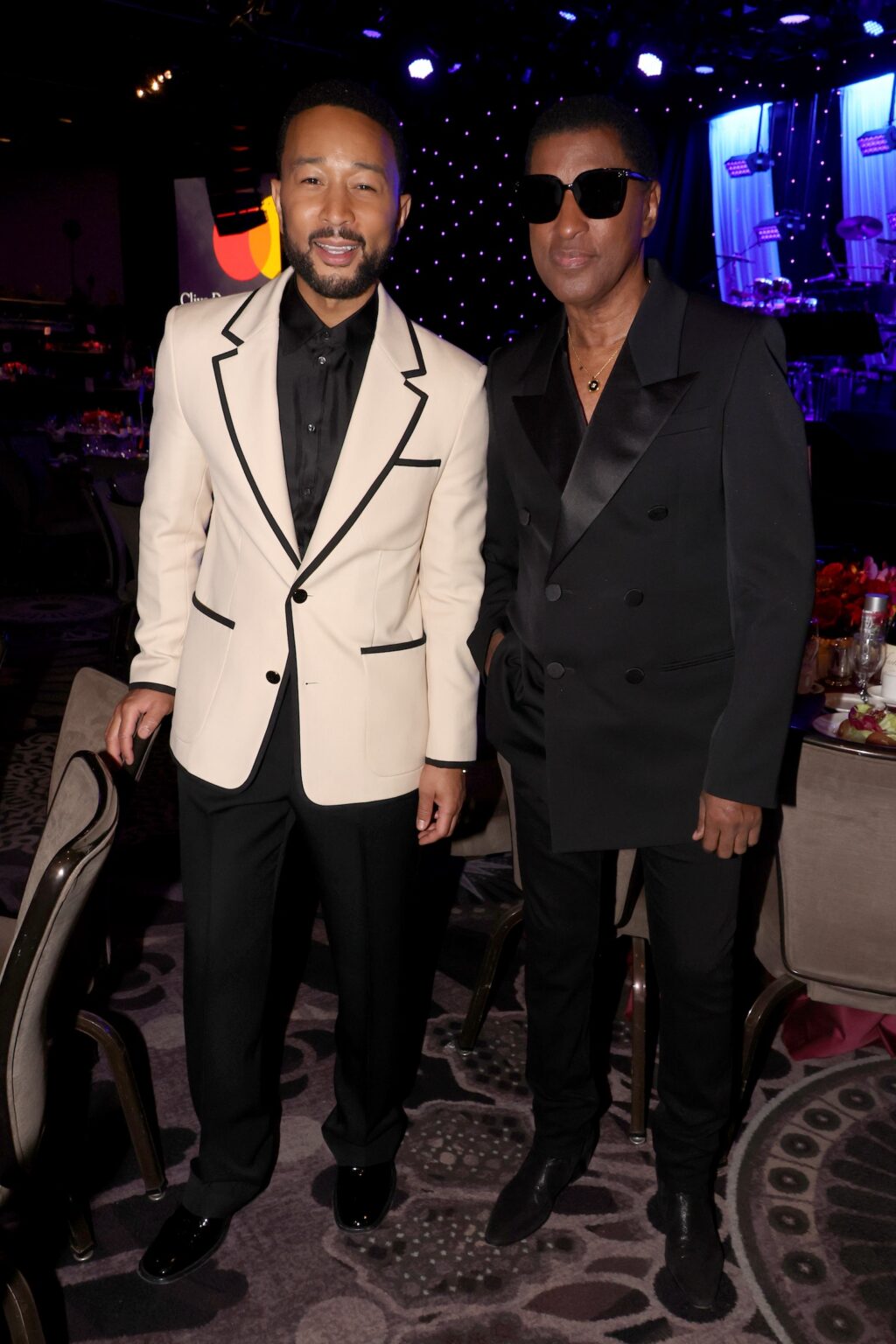 LOS ANGELES, CALIFORNIA - JANUARY 31: (L-R) John Legend and Babyface attend the 68th GRAMMY Awards Pre-GRAMMY Gala & GRAMMY Salute to Industry Icons Honoring Avery Lipman & Monte Lipman on January 31, 2026 in Los Angeles, California. (Photo by Johnny Nunez/Getty Images for The Recording Academy)
