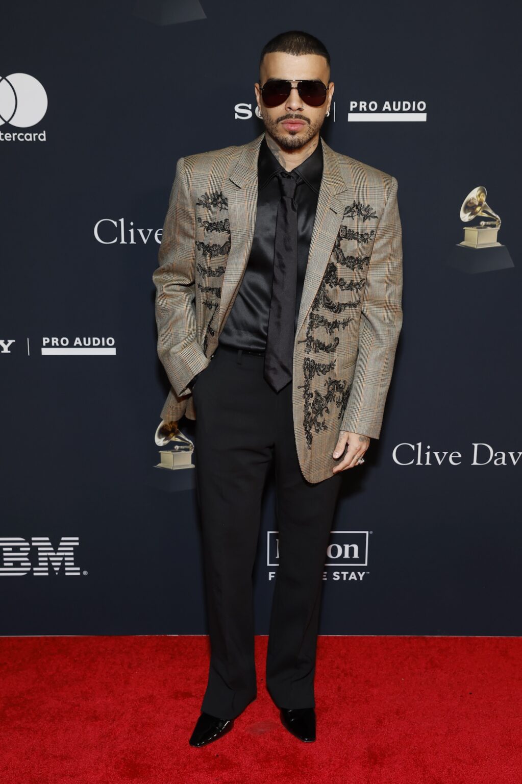 LOS ANGELES, CALIFORNIA - JANUARY 31: Rauw Alejandro attends the 68th GRAMMY Awards Pre-GRAMMY Gala & GRAMMY Salute to Industry Icons Honoring Avery Lipman & Monte Lipman on January 31, 2026 in Los Angeles, California. (Photo by Leon Bennett/Getty Images for The Recording Academy)