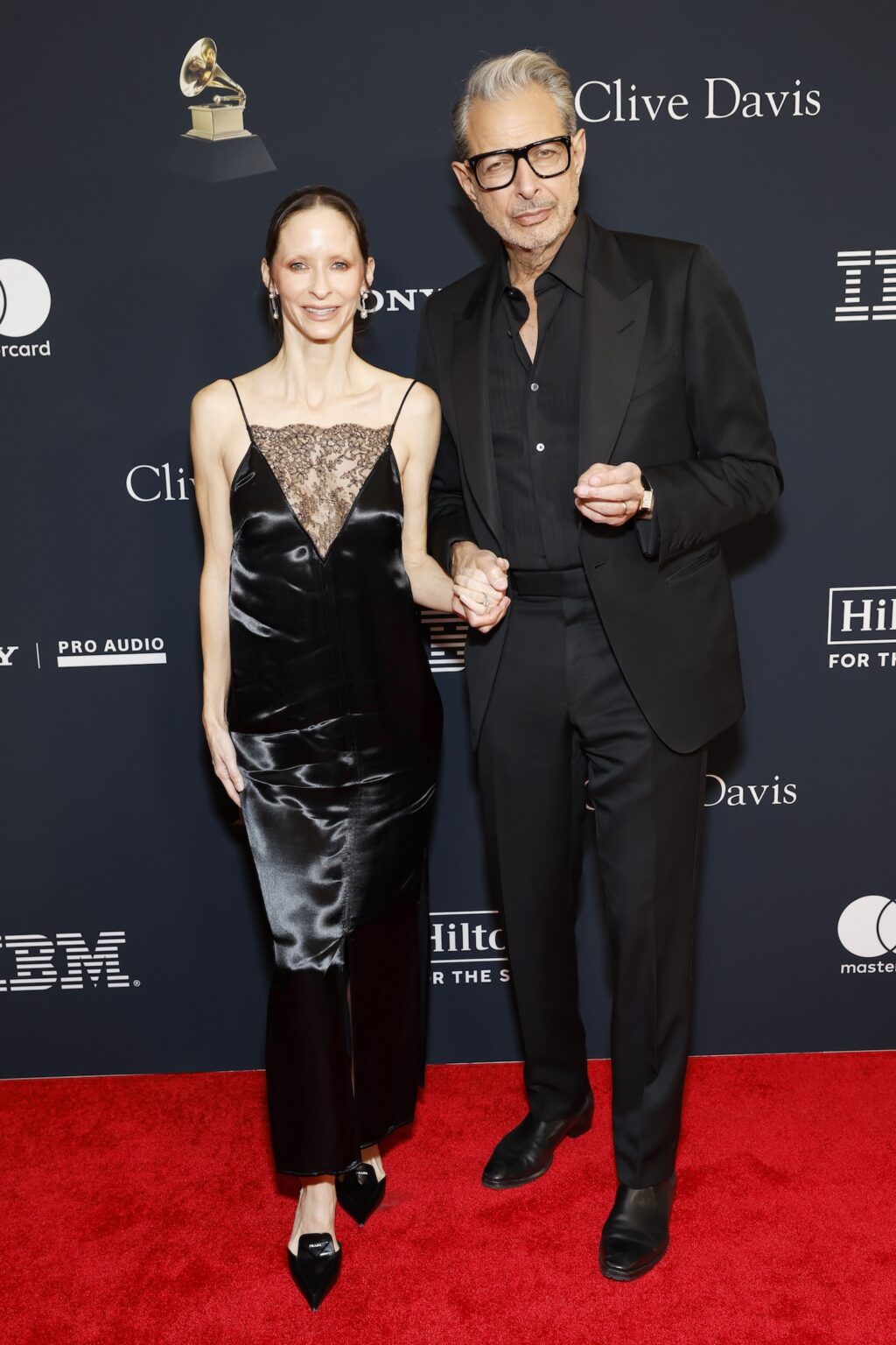LOS ANGELES, CALIFORNIA - JANUARY 31: (L-R) Emilie Livingston and Jeff Goldblum attend the 68th GRAMMY Awards Pre-GRAMMY Gala & GRAMMY Salute to Industry Icons Honoring Avery Lipman & Monte Lipman on January 31, 2026 in Los Angeles, California. (Photo by Leon Bennett/Getty Images for The Recording Academy)