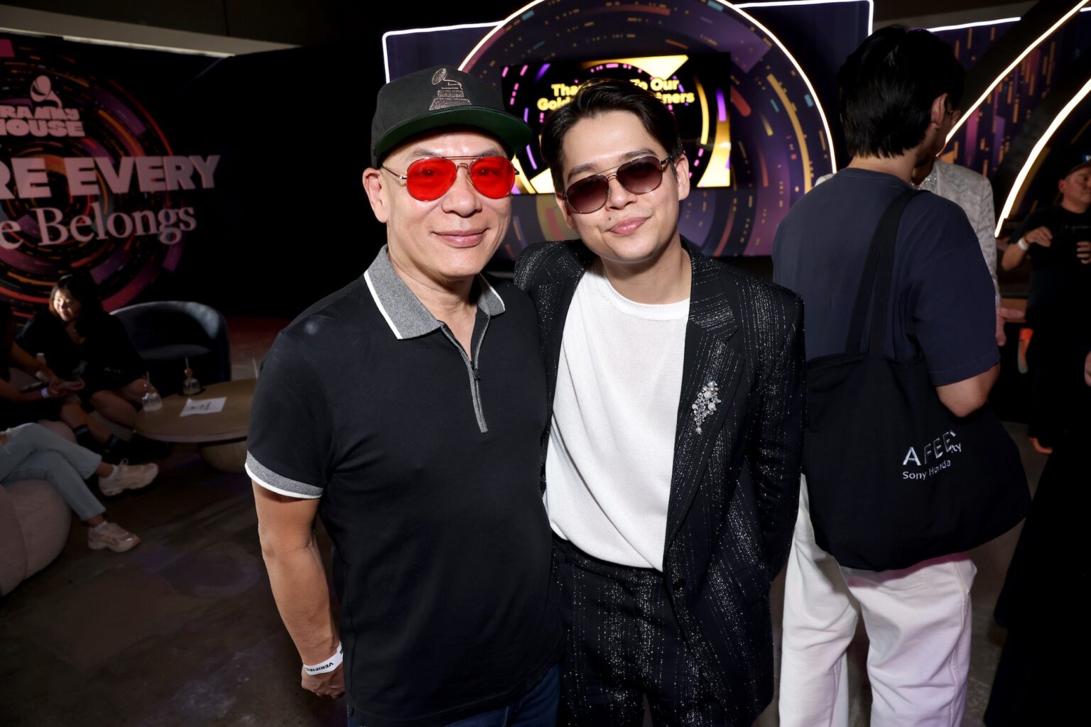 LOS ANGELES, CALIFORNIA - JANUARY 31: (L-R) Dale Edward Chung and Jonathan Miron attend Golden Hour at GRAMMY House during the 68th GRAMMY Awards at Rolling Greens on January 31, 2026 in Los Angeles, California. (Photo by Anna Webber/Getty Images for The Recording Academy)