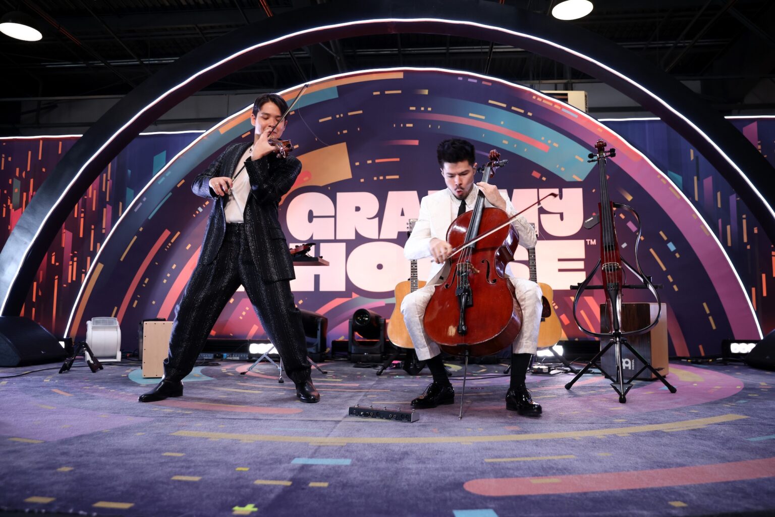 LOS ANGELES, CALIFORNIA - JANUARY 31: (L-R) Jonathan Miron and Philip Sheegog of ARKAI perform onstage during Golden Hour at GRAMMY House during the 68th GRAMMY Awards at Rolling Greens on January 31, 2026 in Los Angeles, California. (Photo by Anna Webber/Getty Images for The Recording Academy)