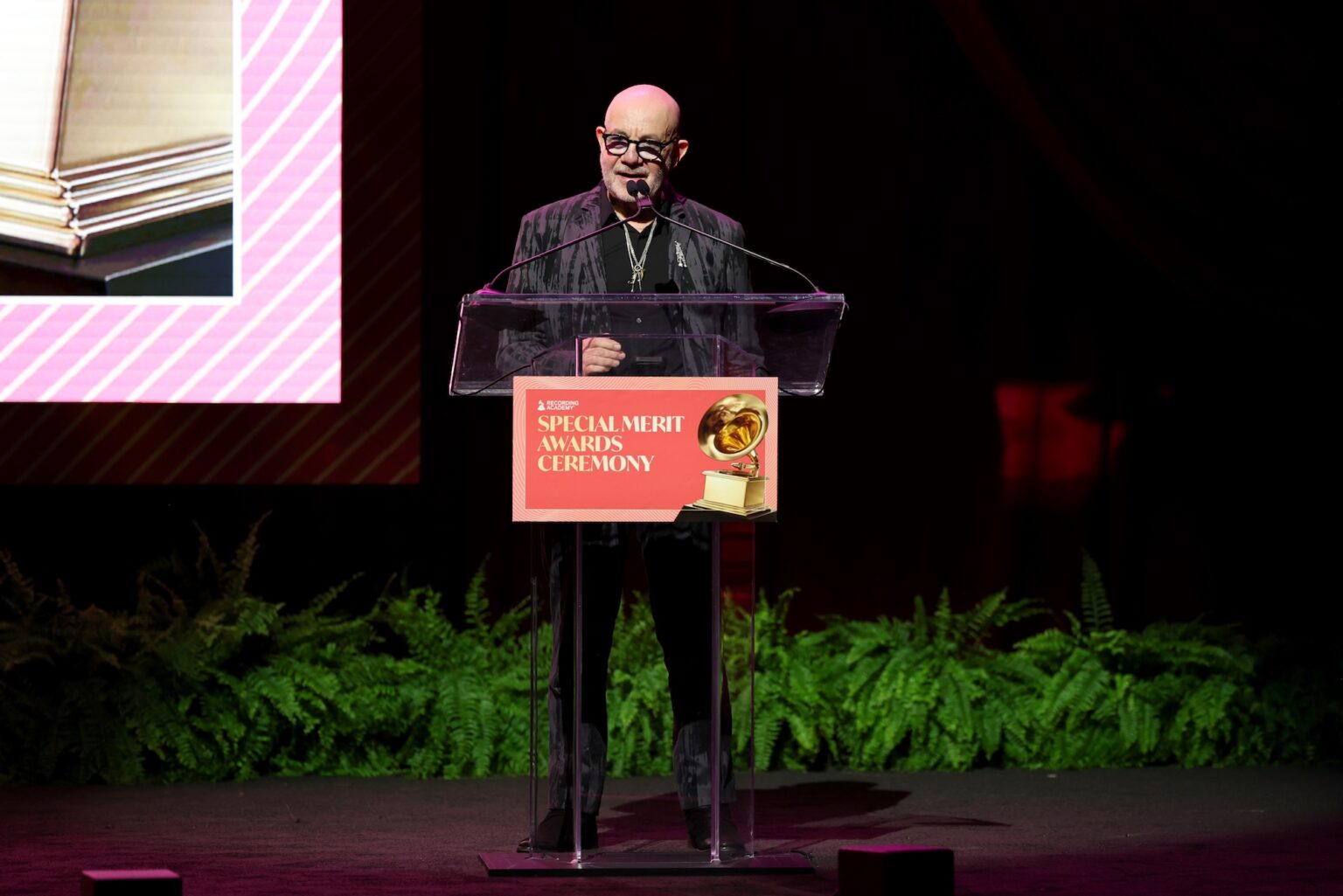 LOS ANGELES, CALIFORNIA - JANUARY 31: Bernie Taupin speaks onstage during the Special Merit Awards Ceremony & 68th Annual GRAMMY Nominees Reception during the 68th GRAMMY Awards on January 31, 2026 in Los Angeles, California. (Photo by Monica Schipper/Getty Images for The Recording Academy)