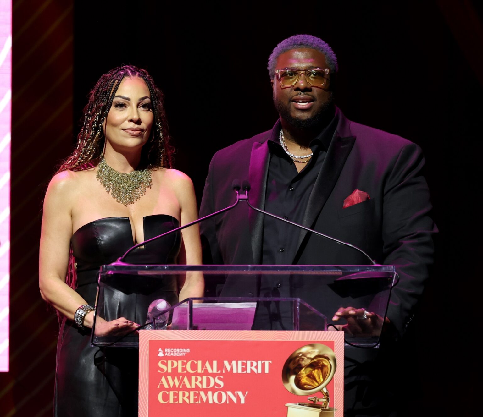 LOS ANGELES, CALIFORNIA - JANUARY 31: (L-R) Marcella Araica and Swagg R’Celious speak onstage during the Special Merit Awards Ceremony & 68th Annual GRAMMY Nominees Reception during the 68th GRAMMY Awards on January 31, 2026 in Los Angeles, California. (Photo by Monica Schipper/Getty Images for The Recording Academy)