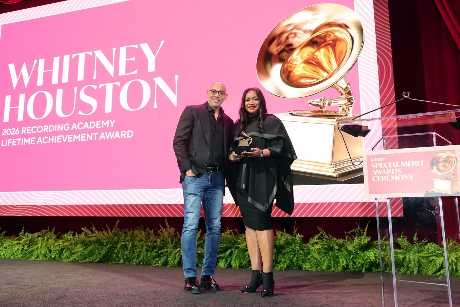 LOS ANGELES, CALIFORNIA - JANUARY 31: (L-R) Harvey Mason jr., CEO, the Recording Academy and Pat Houston pose onstage during the Special Merit Awards Ceremony & 68th Annual GRAMMY Nominees Reception during the 68th GRAMMY Awards on January 31, 2026 in Los Angeles, California. (Photo by Emma McIntyre/Getty Images for The Recording Academy)
