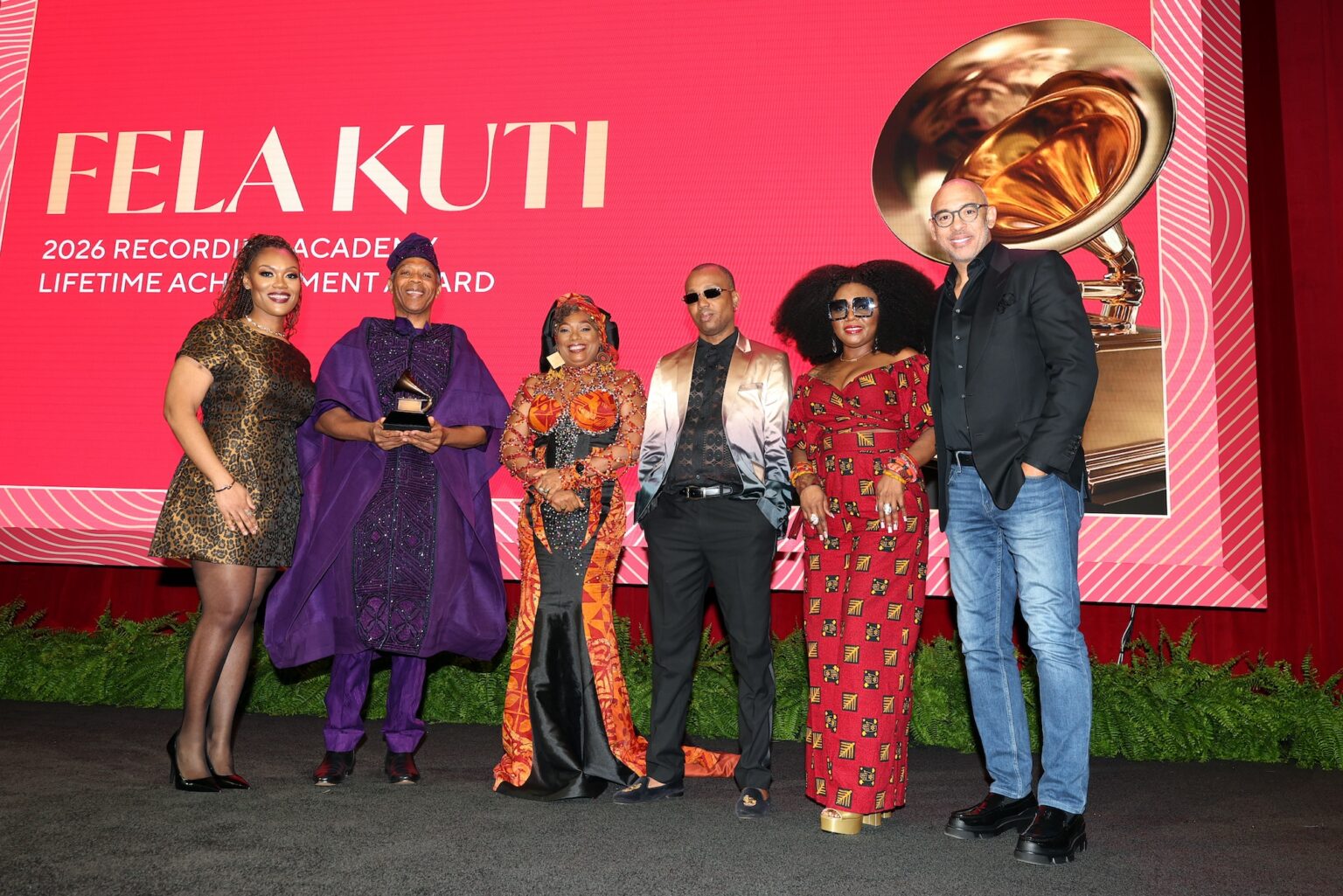 LOS ANGELES, CALIFORNIA - JANUARY 31: (L-R) Chelsey Green, Femi Kuti, Yeni Kuti, Kunle Kuti, Shalewa Kuti and Harvey Mason jr., CEO, the Recording Academy pose onstage during the Special Merit Awards Ceremony & 68th Annual GRAMMY Nominees Reception during the 68th GRAMMY Awards on January 31, 2026 in Los Angeles, California. (Photo by Mat Hayward/Getty Images for The Recording Academy)