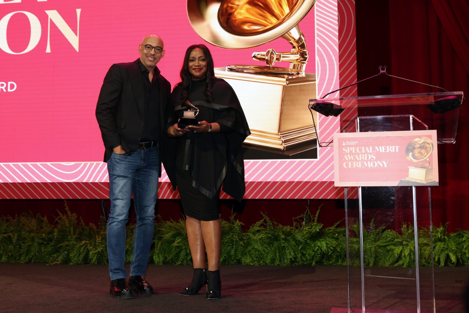 LOS ANGELES, CALIFORNIA - JANUARY 31: (L-R) Harvey Mason jr., CEO, the Recording Academy and Pat Houston pose onstage during the Special Merit Awards Ceremony & 68th Annual GRAMMY Nominees Reception during the 68th GRAMMY Awards on January 31, 2026 in Los Angeles, California. (Photo by Mat Hayward/Getty Images for The Recording Academy)