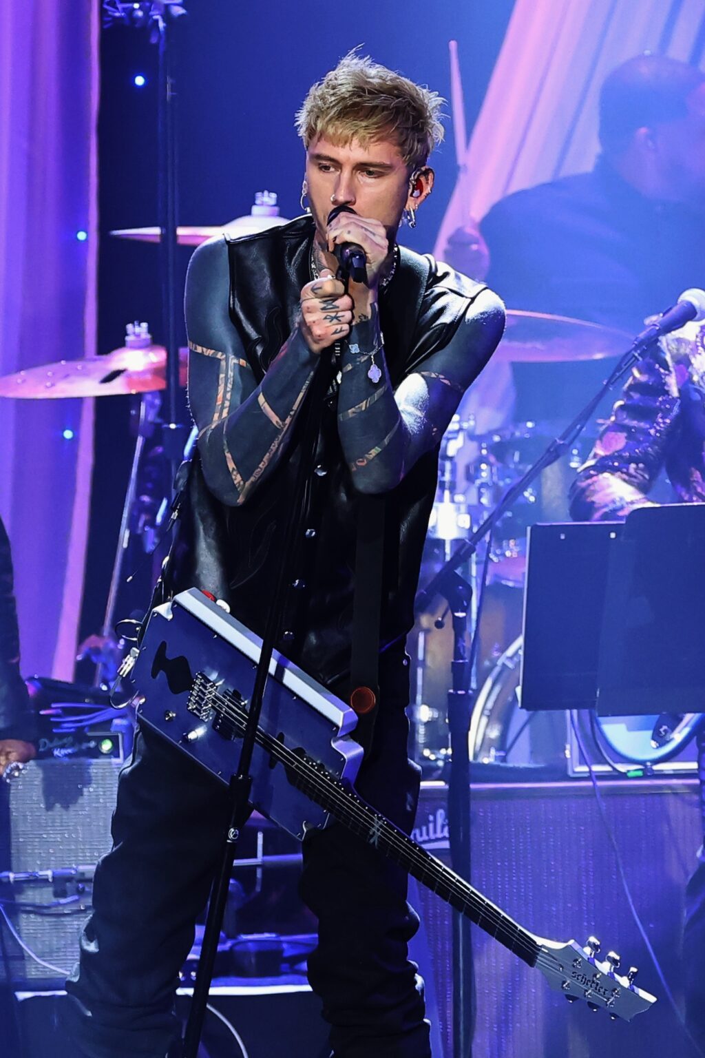 LOS ANGELES, CALIFORNIA - JANUARY 31: mgk performs onstage during the 68th GRAMMY Awards Pre-GRAMMY Gala & GRAMMY Salute to Industry Icons Honoring Avery Lipman & Monte Lipman on January 31, 2026 in Los Angeles, California. (Photo by Leon Bennett/Getty Images for The Recording Academy)