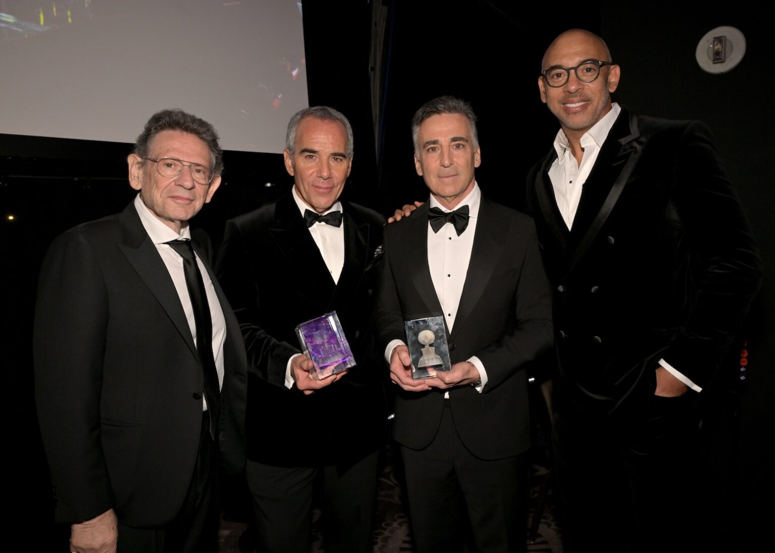 LOS ANGELES, CALIFORNIA - JANUARY 31: (L-R) Sir Lucian Grainge, Honoree Monte Lipman, Honoree Avery Lipman and Harvey Mason jr., CEO of the Recording Academy attend the 68th GRAMMY Awards Pre-GRAMMY Gala & GRAMMY Salute to Industry Icons Honoring Avery Lipman & Monte Lipman on January 31, 2026 in Los Angeles, California. (Photo by Lester Cohen/Getty Images for The Recording Academy)