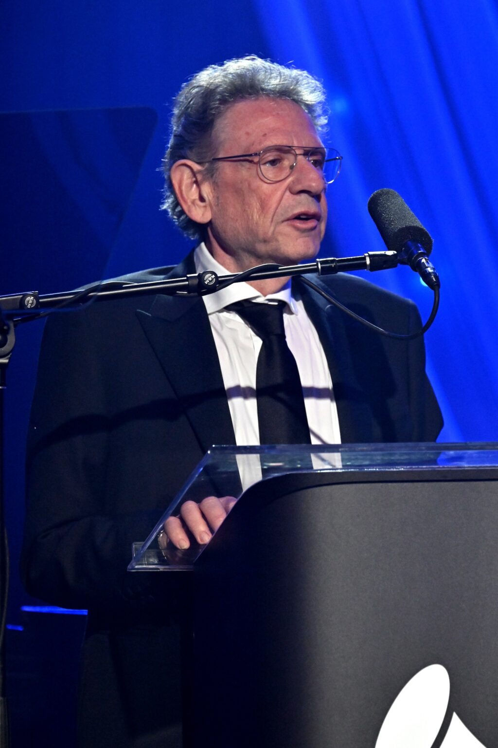 LOS ANGELES, CALIFORNIA - JANUARY 31: Sir Lucian Grainge speaks onstage at the 68th GRAMMY Awards Pre-GRAMMY Gala & GRAMMY Salute to Industry Icons Honoring Avery Lipman & Monte Lipman on January 31, 2026 in Los Angeles, California. (Photo by Lester Cohen/Getty Images for The Recording Academy)