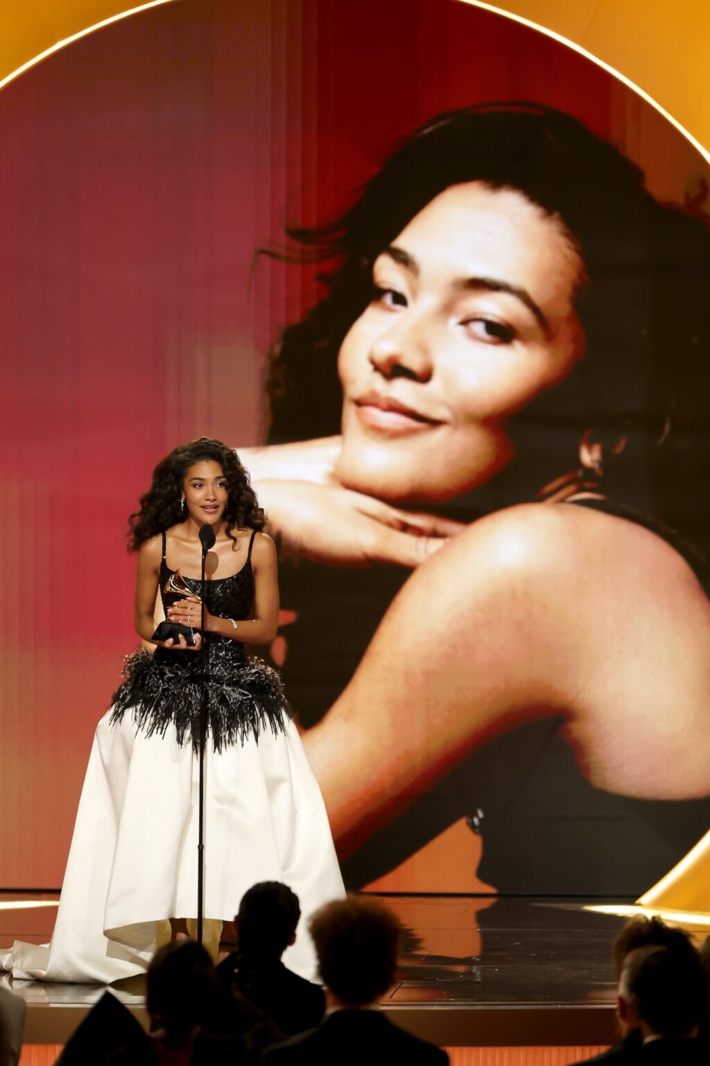 LOS ANGELES, CALIFORNIA - FEBRUARY 01: Olivia Dean accepts the Best New Artist award onstage during the 68th GRAMMY Awards at Crypto.com Arena on February 01, 2026 in Los Angeles, California. (Photo by Kevin Winter/Getty Images for The Recording Academy)