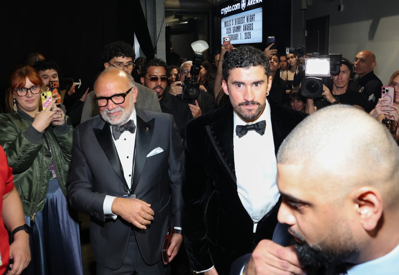 LOS ANGELES, CALIFORNIA - FEBRUARY 01: (L-R) Manuel Abud and Bad Bunny attend the 68th GRAMMY Awards at Crypto.com Arena on February 01, 2026 in Los Angeles, California. (Photo by Monica Schipper/Getty Images for The Recording Academy)