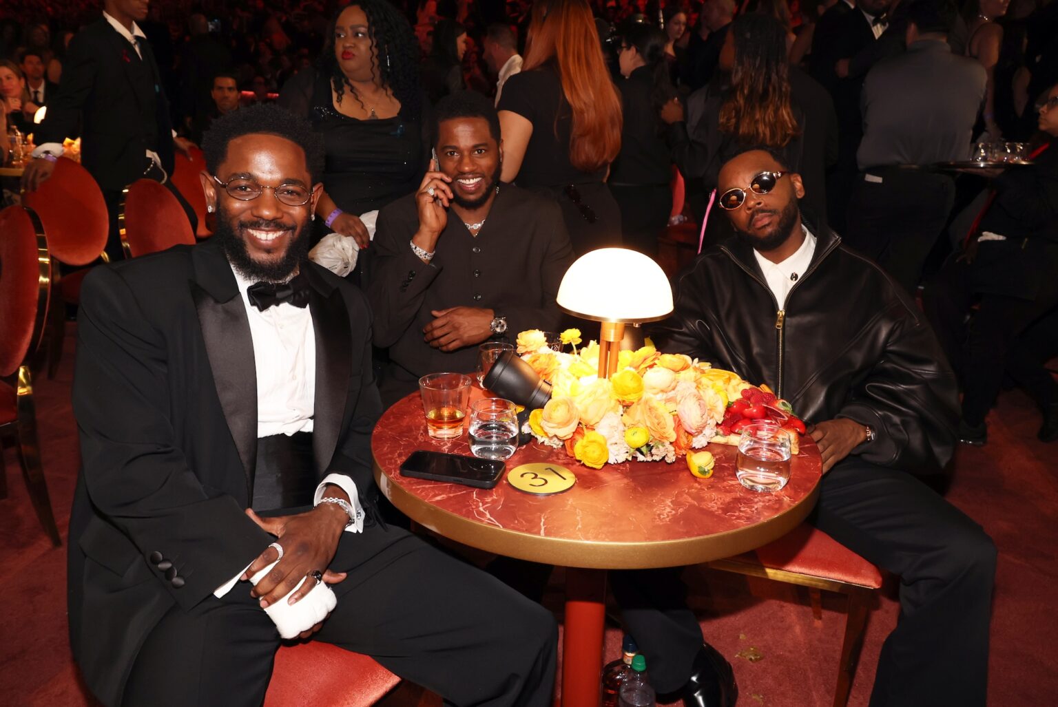 LOS ANGELES, CALIFORNIA - FEBRUARY 01: Kendrick Lamar, Dave Free, and Sounwave attend the 68th GRAMMY Awards at Crypto.com Arena on February 01, 2026 in Los Angeles, California. (Photo by Johnny Nunez/Getty Images for The Recording Academy)