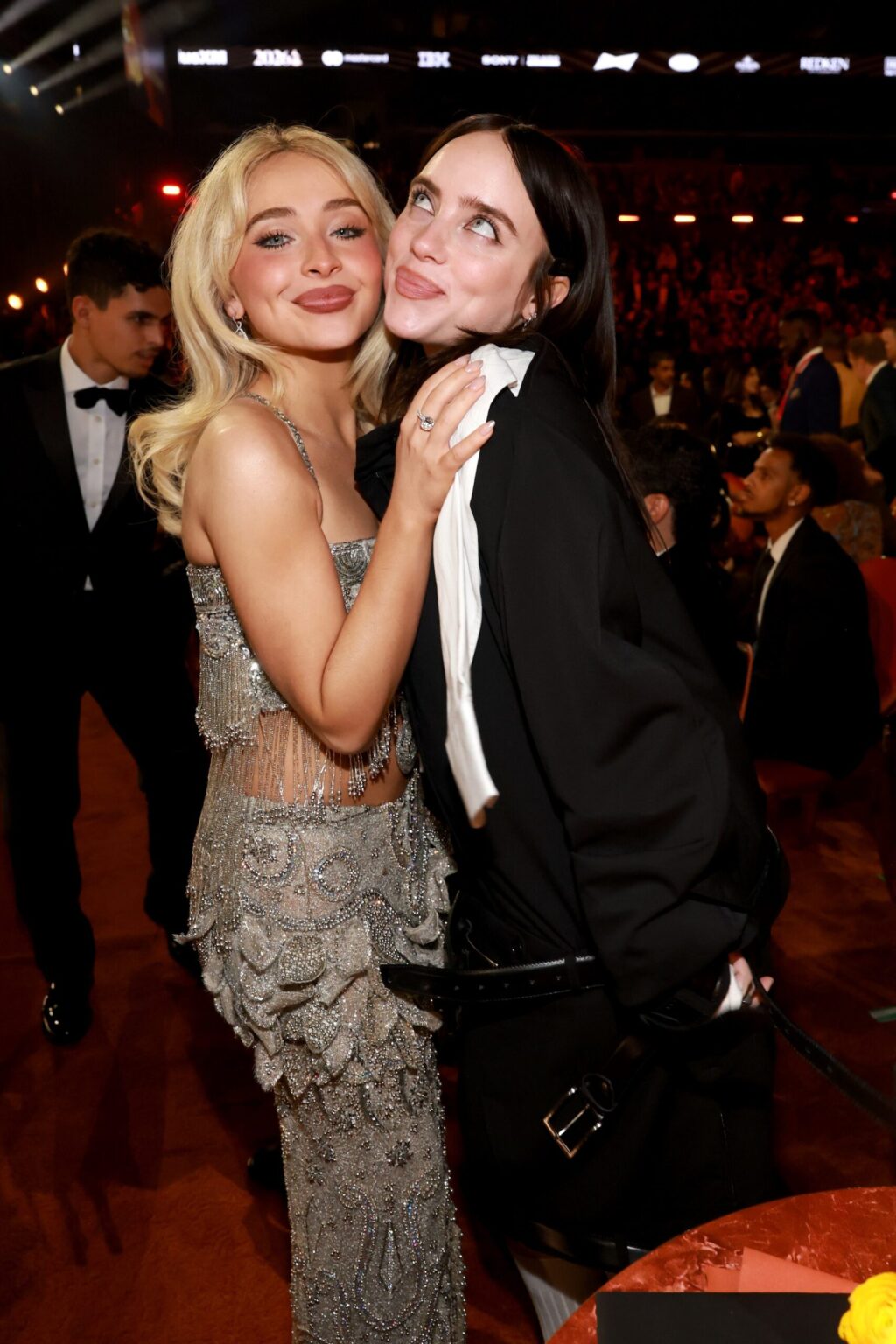 LOS ANGELES, CALIFORNIA - FEBRUARY 01: (L-R) Sabrina Carpenter and Billie Eilish attend the 68th GRAMMY Awards at Crypto.com Arena on February 01, 2026 in Los Angeles, California. (Photo by Kevin Mazur/Getty Images for The Recording Academy)