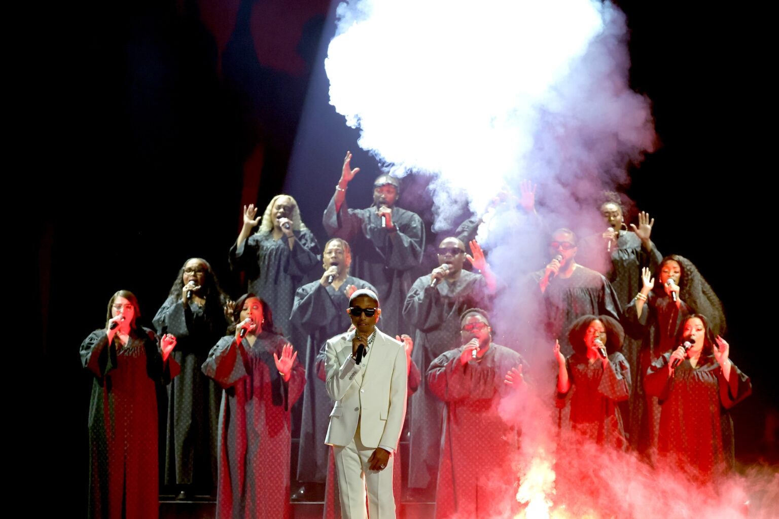 LOS ANGELES, CALIFORNIA - FEBRUARY 01: Pharrell Williams (C) performs onstage during the 68th GRAMMY Awards at Crypto.com Arena on February 01, 2026 in Los Angeles, California. (Photo by Kevin Winter/Getty Images for The Recording Academy)