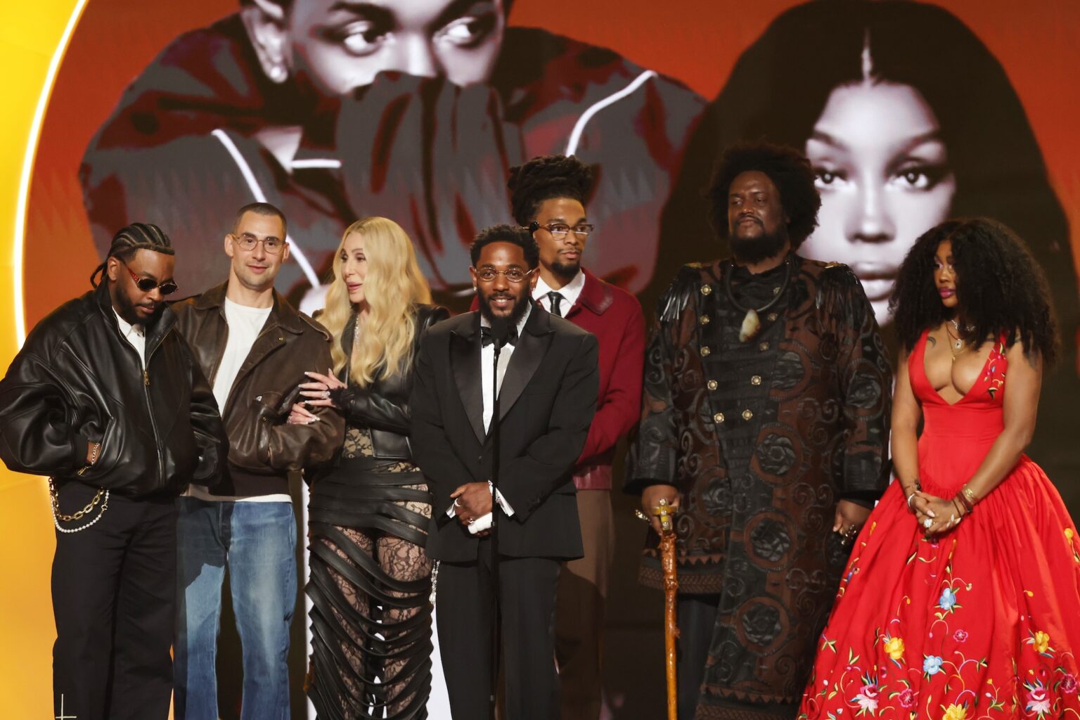 LOS ANGELES, CALIFORNIA - FEBRUARY 01: Cher (3rd L) presents the Record Of The Year award for "luther" to (from L) Sounwave, Jack Antonoff, Kendrick Lamar, Scott Bridgeway, Kamasi Washington, and SZA onstage during the 68th GRAMMY Awards at Crypto.com Arena on February 01, 2026 in Los Angeles, California. (Photo by Kevin Winter/Getty Images for The Recording Academy)