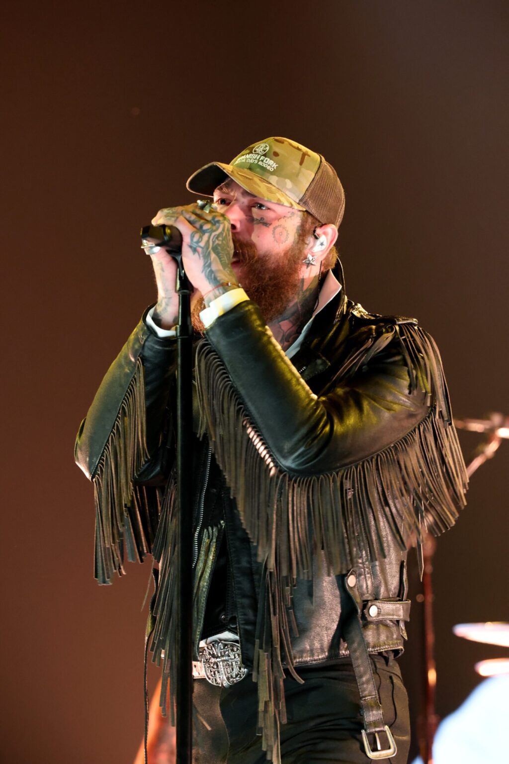 LOS ANGELES, CALIFORNIA - FEBRUARY 01: Post Malone performs onstage during the 68th GRAMMY Awards at Crypto.com Arena on February 01, 2026 in Los Angeles, California. (Photo by Kevin Mazur/Getty Images for The Recording Academy)