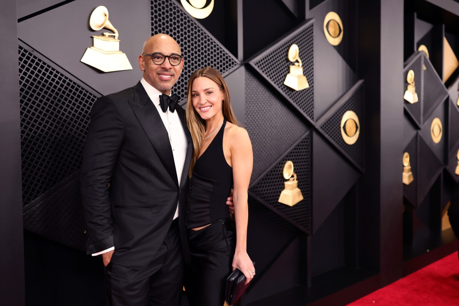 LOS ANGELES, CALIFORNIA - FEBRUARY 01: (L-R) Harvey Mason jr., CEO, the Recording Academy, and Britt Mason attend the 68th GRAMMY Awards on February 01, 2026 in Los Angeles, California. (Photo by Emma McIntyre/Getty Images for The Recording Academy)