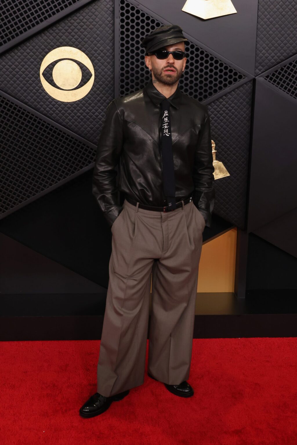 LOS ANGELES, CALIFORNIA - FEBRUARY 01: Feid attends the 68th GRAMMY Awards on February 01, 2026 in Los Angeles, California. (Photo by John Shearer/Getty Images for The Recording Academy)