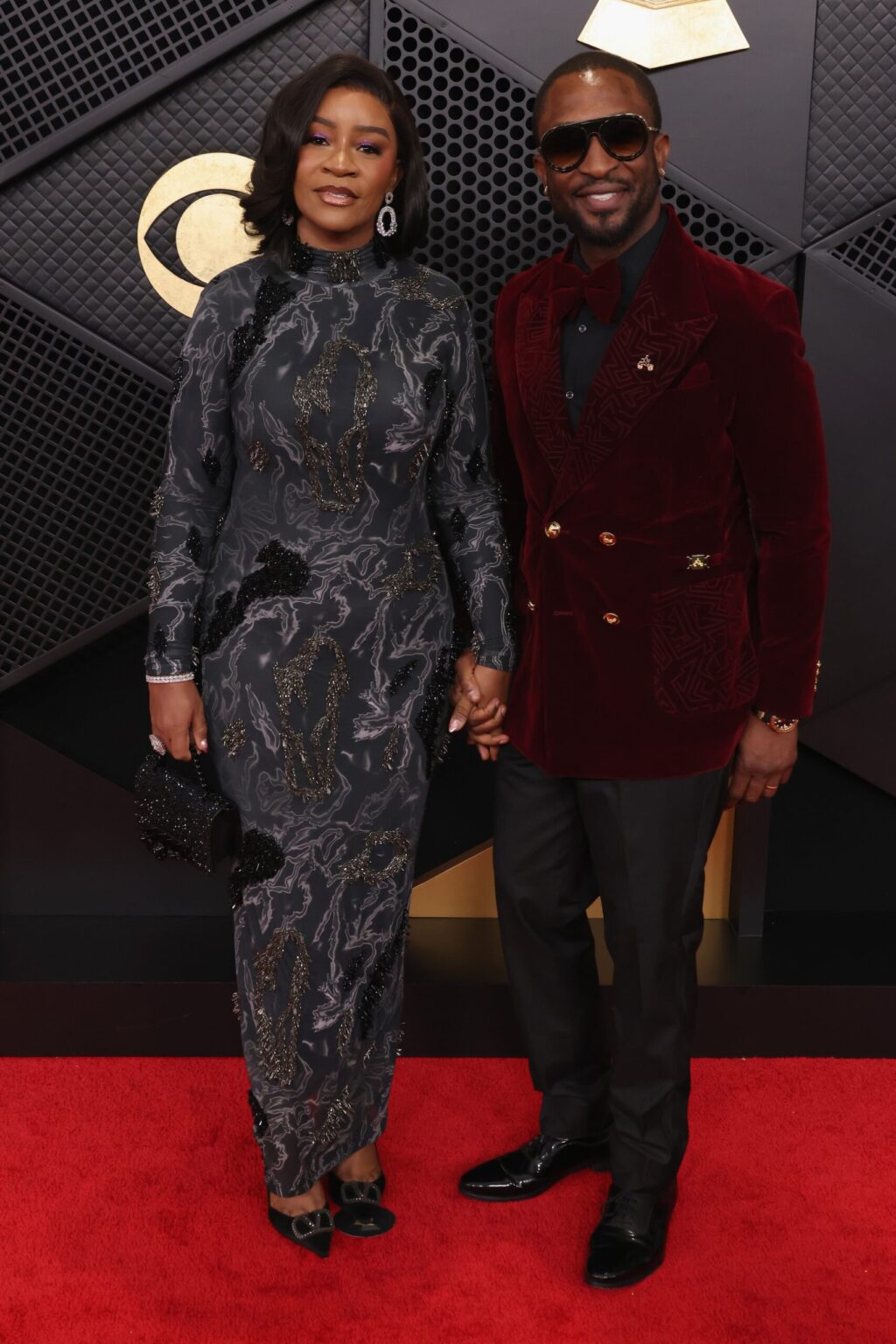 LOS ANGELES, CALIFORNIA - FEBRUARY 01: (L-R) Deola Art Alade and Darey Art Alade attend the 68th GRAMMY Awards on February 01, 2026 in Los Angeles, California. (Photo by John Shearer/Getty Images for The Recording Academy)