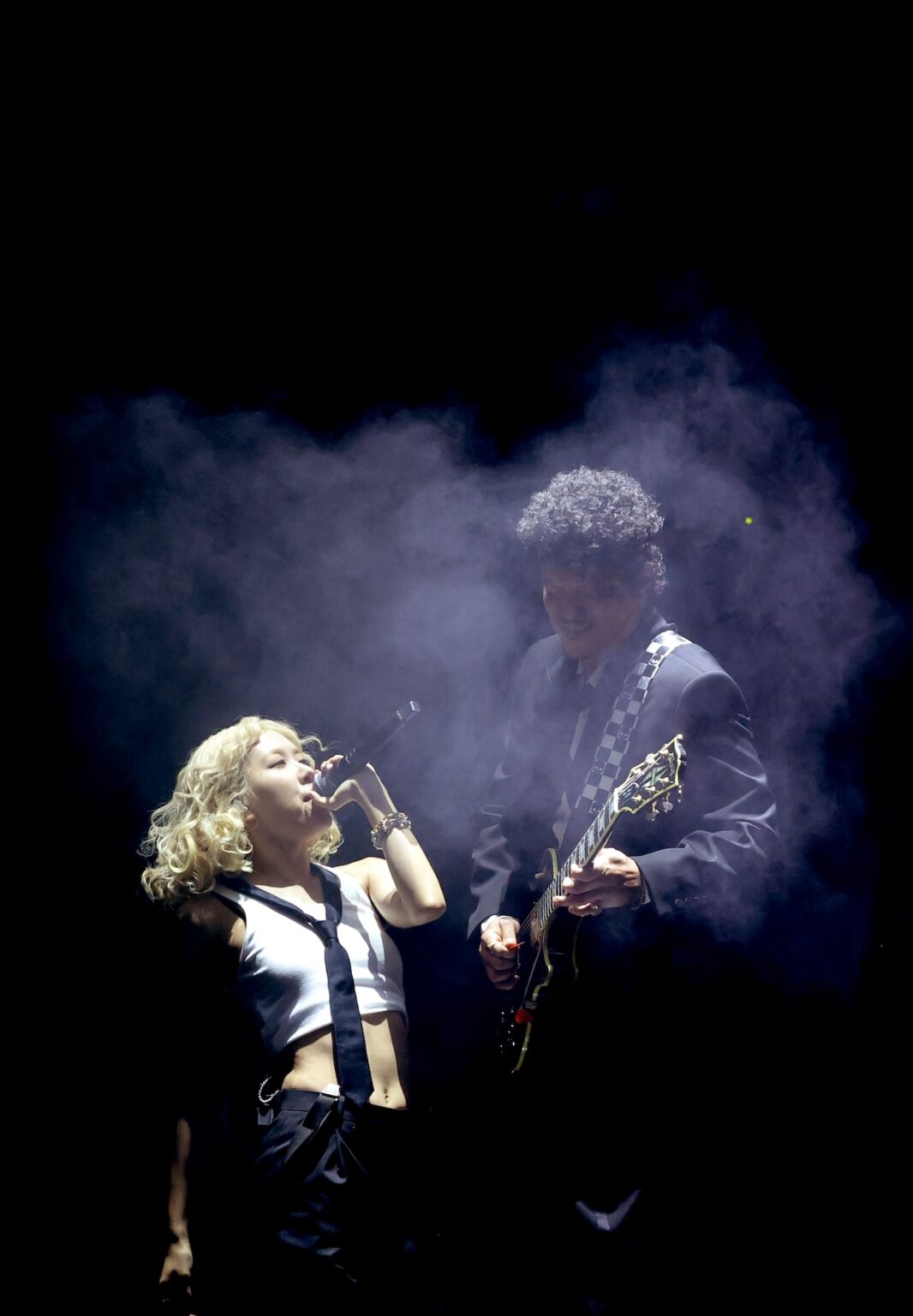 LOS ANGELES, CALIFORNIA - FEBRUARY 01: (L-R) Rosé and Bruno Mars perform onstage during the 68th GRAMMY Awards at Crypto.com Arena on February 01, 2026 in Los Angeles, California. (Photo by Kevin Winter/Getty Images for The Recording Academy)