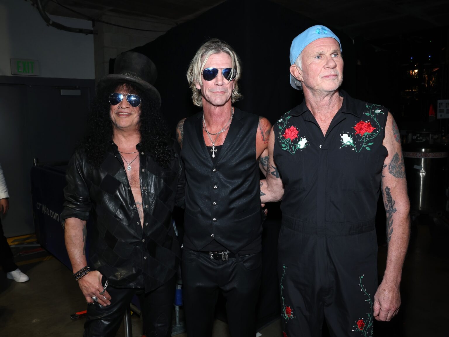 LOS ANGELES, CALIFORNIA - FEBRUARY 01: (L-R) Slash, Duff McKagan and Chad Smith attend the 68th GRAMMY Awards at Crypto.com Arena on February 01, 2026 in Los Angeles, California. (Photo by Monica Schipper/Getty Images for The Recording Academy)