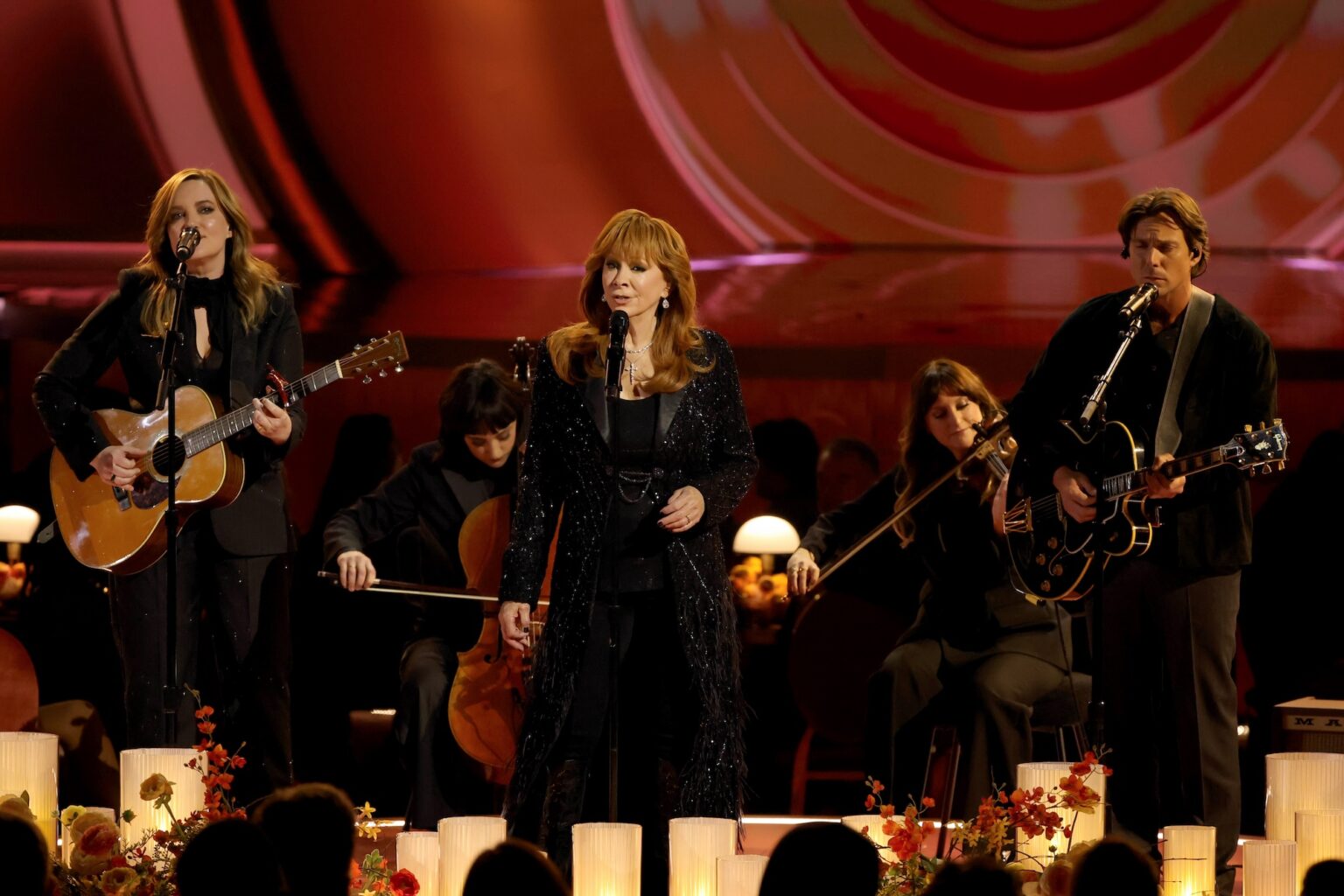 LOS ANGELES, CALIFORNIA - FEBRUARY 01: (L-R) Brandy Clark, Reba McEntire and Lukas Nelson perform onstage during the 68th GRAMMY Awards at Crypto.com Arena on February 01, 2026 in Los Angeles, California. (Photo by Kevin Winter/Getty Images for The Recording Academy)