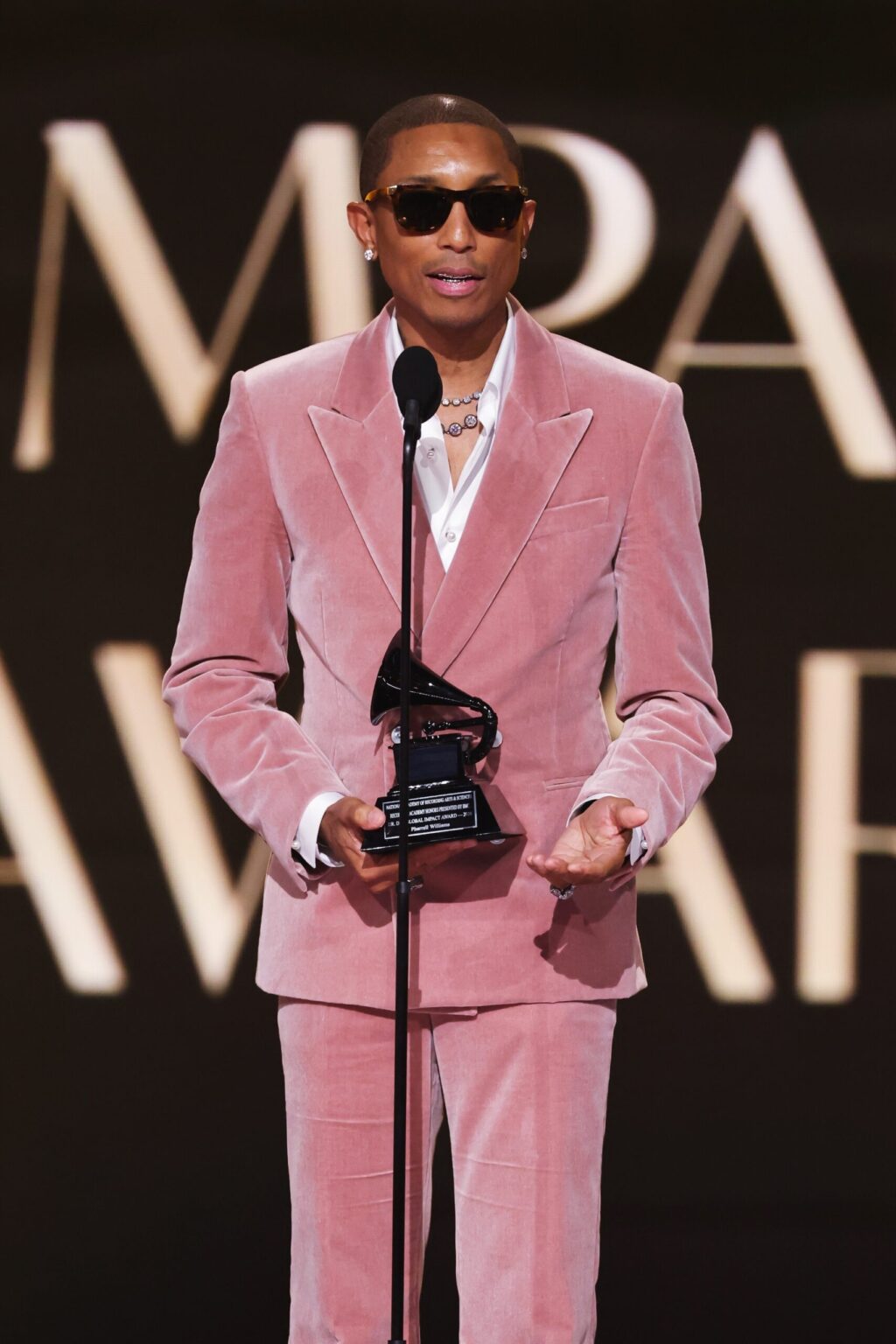 LOS ANGELES, CALIFORNIA - FEBRUARY 01: Honoree Pharrell Williams accepts the Dr. Dre Global Impact Award onstage during the 68th GRAMMY Awards at Crypto.com Arena on February 01, 2026 in Los Angeles, California. (Photo by Kevin Winter/Getty Images for The Recording Academy)