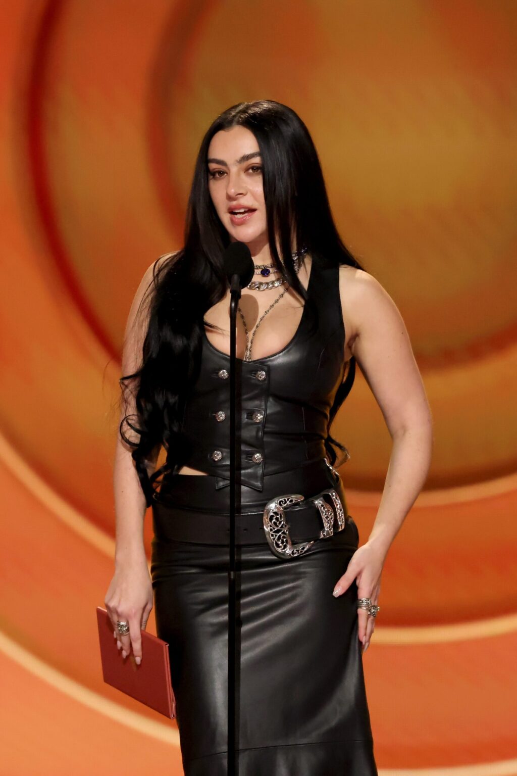 LOS ANGELES, CALIFORNIA - FEBRUARY 01: Charli xcx speaks onstage during the 68th GRAMMY Awards at Crypto.com Arena on February 01, 2026 in Los Angeles, California. (Photo by Kevin Winter/Getty Images for The Recording Academy)