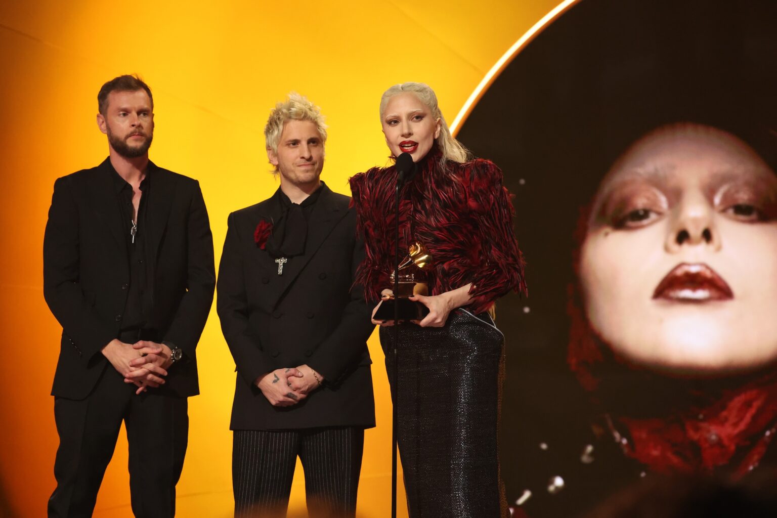 LOS ANGELES, CALIFORNIA - FEBRUARY 01: Lady Gaga (R) accepts the award for Best Pop Vocal Album for "MAYHEM" with Cirkut and Andrew Watt onstage during the 68th GRAMMY Awards at Crypto.com Arena on February 01, 2026 in Los Angeles, California. (Photo by Kevin Mazur/Getty Images for The Recording Academy)
