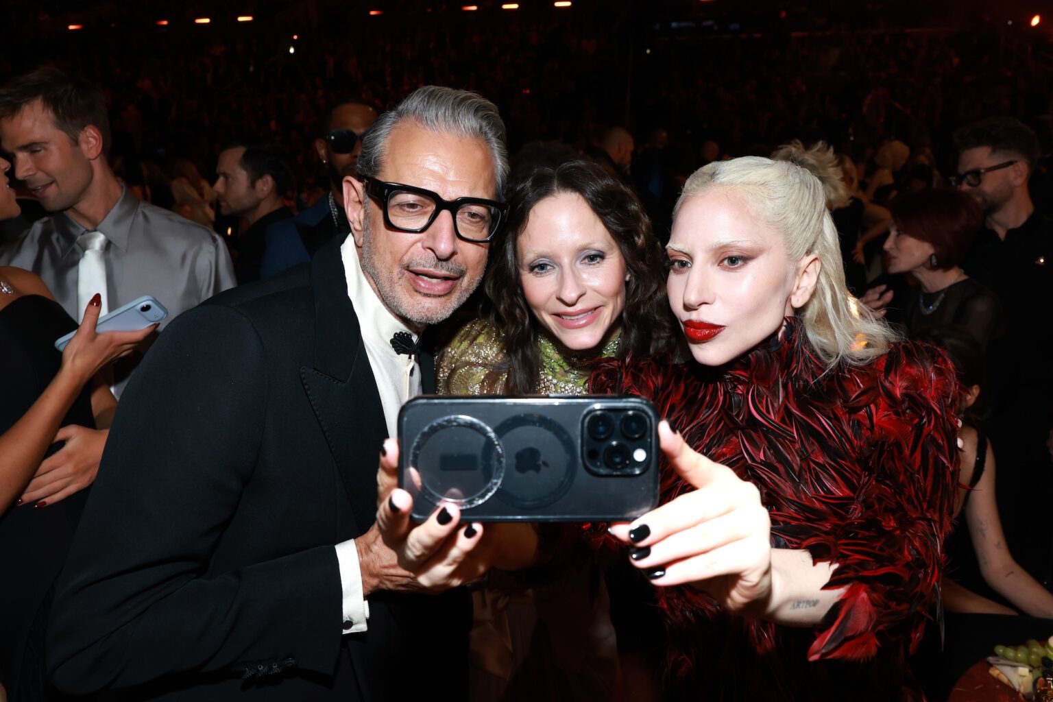LOS ANGELES, CALIFORNIA - FEBRUARY 01: (L-R) Jeff Goldblum, Emilie Livingston, and Lady Gaga attend the 68th GRAMMY Awards at Crypto.com Arena on February 01, 2026 in Los Angeles, California. (Photo by Kevin Mazur/Getty Images for The Recording Academy)