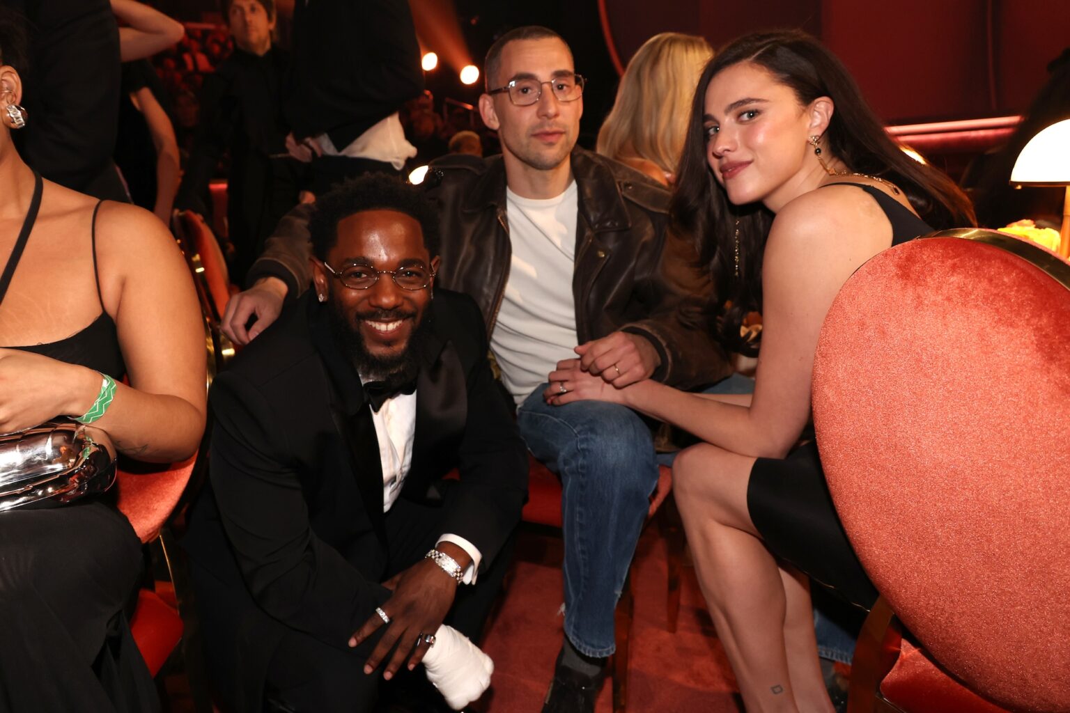 LOS ANGELES, CALIFORNIA - FEBRUARY 01: (L-R) Kendrick Lamar, Jack Antonoff and Margaret Qualley attend the 68th GRAMMY Awards at Crypto.com Arena on February 01, 2026 in Los Angeles, California. (Photo by Johnny Nunez/Getty Images for The Recording Academy)